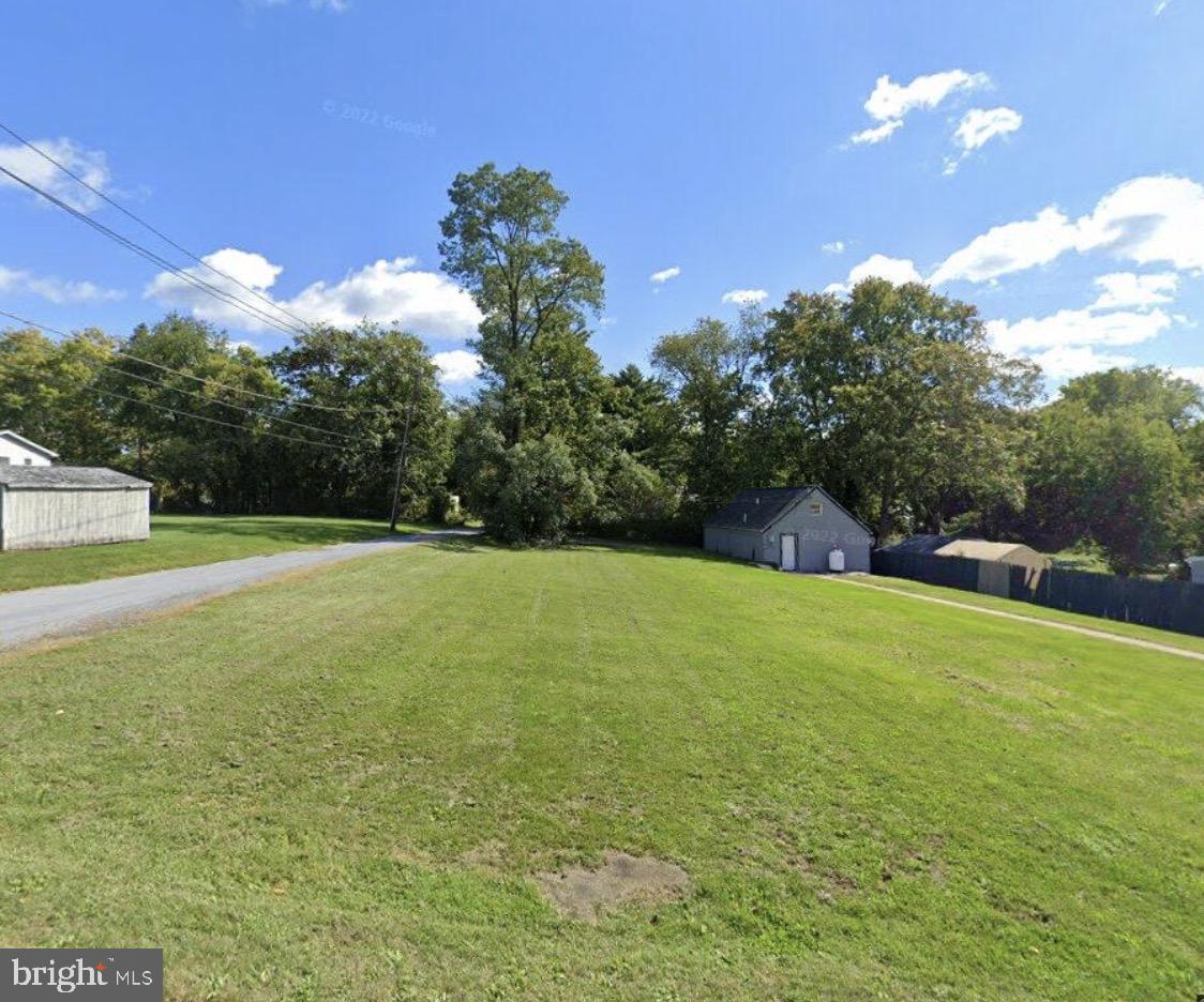 Cleared vacant lot offering an ideal setting for new construction. Located on a quiet road with convenient access to major routes, schools, shopping, dining, and local amenities. Previously the site of a residential dwelling with public water and sewer availability. Suitable for builders, investors, or owner-occupants.