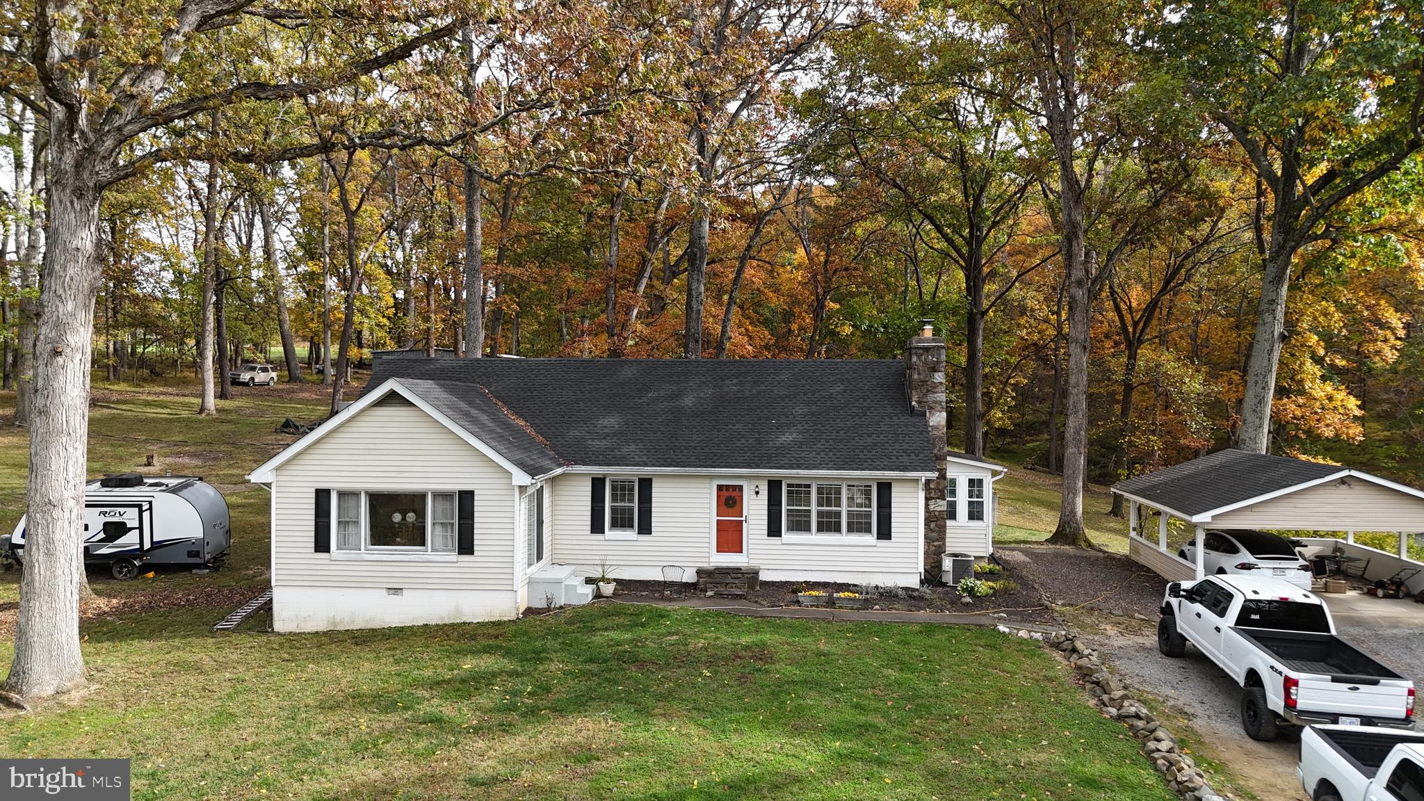 Welcome to 18758 Telegraph Springs Road — a charming and thoughtfully improved 3-bedroom, 2-bath home on 5.6 acres in the heart of Western Loudoun’s horse and wine country. This inviting property combines the appeal of rural living with a long list of meaningful updates, including an updated kitchen with granite countertops, newer cabinetry and appliances, refinished wood floors, an added third-floor bedroom, enclosed porch/sunroom, and major recent improvements such as roof replacement, updated HVAC, well pump replacement, and sewer line replacement. With nearly 1,500 square feet of living space and more than five acres of usable land, the property is ideally suited for horses, livestock, hobby farming, or anyone seeking a more functional country lifestyle. A large workshop, run-in shed, and equipment sheds are already in place, making it easy to enjoy from day one. All this, just minutes from downtown Purcellville’s shops, restaurants, and the W&OD Trail, and less than an hour from Washington, D.C.  NOTE: Property includes a separate 1-acre parcel with its own parcel ID (491184854000) and address, which may offer future residential potential. Buyer should verify all build-ability, zoning, and well/septic approvals with Loudoun County.