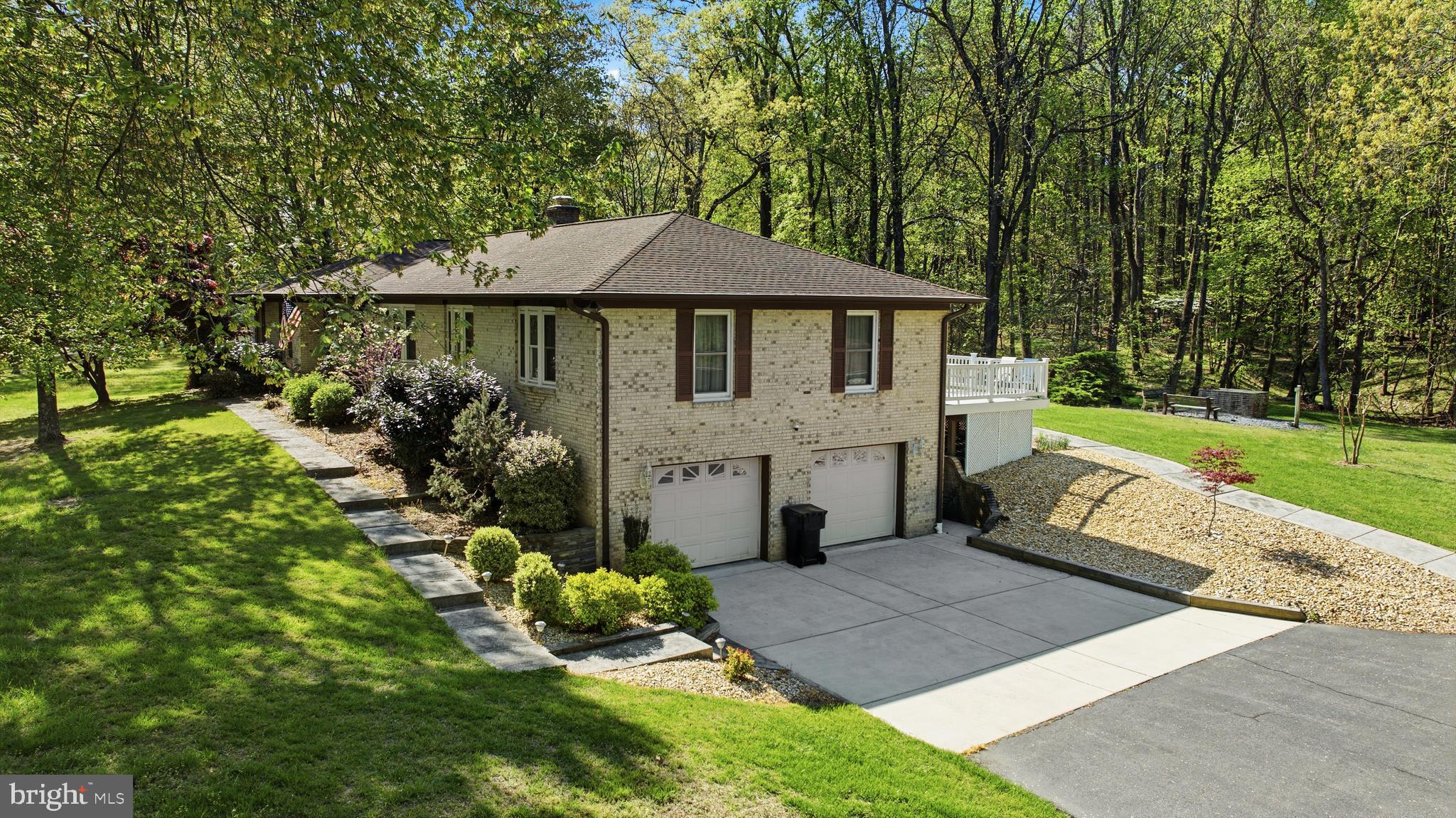 Great weekend for you to take a drive and check this one out! 
Tucked away in a serene setting, this beautiful home offers the perfect balance of privacy and neighborhood charm, truly your own piece of heaven while still enjoying a sense of community. Situated on 2.49 acres, the property provides both front and backyard space, ideal for relaxing, entertaining, enjoying nature, and watching local wildlife.

This custom-built home, proudly owned by the original owner, features 3 bedrooms and 2 full baths, along with a garage basement offering additional space and versatility. The main level showcases hardwood flooring throughout and a cozy fireplace, perfect for chilly evenings or simply unwinding at home.

The kitchen offers an eat-in area along with a dining combination, providing plenty of room for everyday living and hosting gatherings with family and friends. Whether it’s a casual get-together or a special occasion, this home is designed for making lasting memories.

A rare opportunity to own a well-cared-for, custom home in a peaceful setting, ready for its next chapter and new memories to be made.