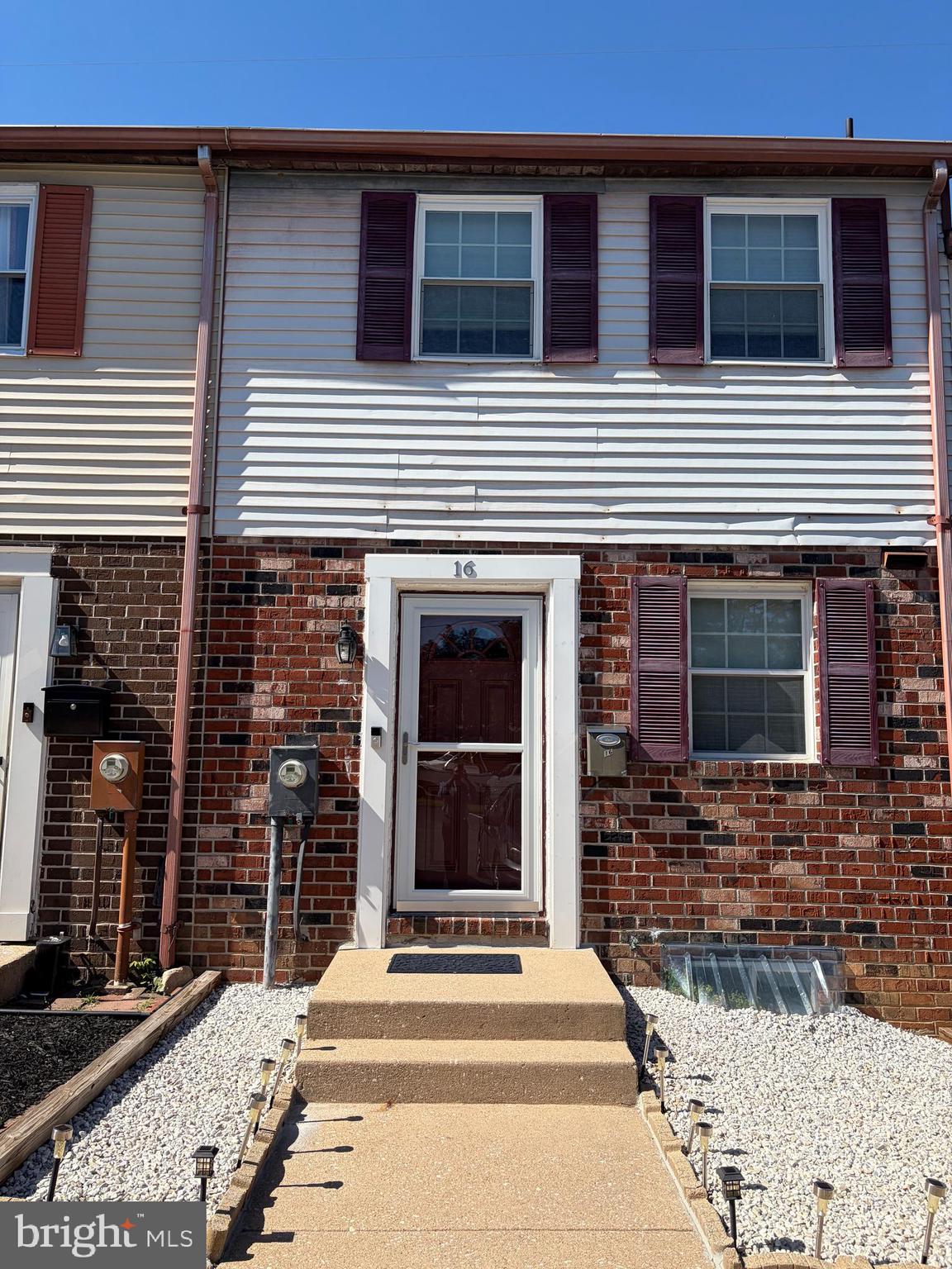 Welcome to a beautifully updated and move-in ready 2-bedroom, 2.5-bath townhouse offering 1,536 sq. ft. of modern living space. This stunning home features expensive hardwood floors, recessed lighting, and a bright, custom-designed kitchen with brand-new custom cabinets, granite countertops, stainless steel appliances, modern backsplash graphics, and stylish finishes throughout. The finished basement provides additional living or entertainment space, complemented by a new sliding door leading to a private patio — perfect for relaxing or hosting guests. The entire home has been freshly painted and includes ceramic tile flooring in the basement and all bathrooms, new bathtubs, all new sinks and water faucets, brand-new backsplashes in both full baths, all new toilets, and updated electrical fixtures. Additional upgrades feature all new doors, including custom-made bedroom doors, door knobs, and hinges, a new custom security entrance door, new windows throughout, new storm door, recent roof, recent water heater and AC, and assigned parking with guest spaces available. Conveniently located near shopping, dining, and major commuter routes — this home is totally updated, beautifully maintained, and truly move-in ready. EXCLUDING:  Will not convey-  Security cameras, blinds, curtains, window shades, toaster oven, microwave, washer & dryer.