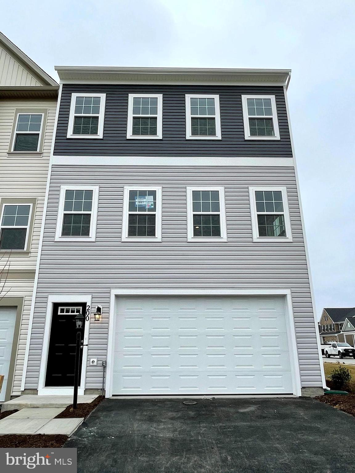 Gorgeous2 Car Garage End Unit TH for rent in Snowden Bridge.  Lower Level Rec room with Half Bath.  Entire Main Level Open with Hardwood stairs, Stainless Steel Appliances and Big Island. Upstairs 3 BRs with 2 Full Baths.
