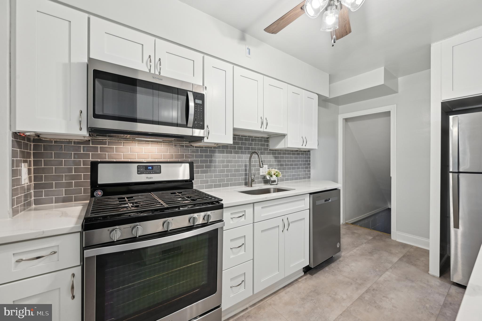 Charming Catonsville Home with Modern Upgrades!

Welcome to 165 Cherrydell Rd, a beautifully updated 3-bedroom, 1.5-bath home blending classic charm with modern updates.

Step into the brand-new kitchen, featuring stainless steel appliances and upgraded countertops—perfect for cooking and entertaining. The entire home has been freshly painted, and the refinished hardwood floors on the main and second levels add warmth and character, with the main floor showcasing its original red oak flooring.

The partially finished lower level offers great flexibility as a rec room or family room, and also includes a dedicated laundry room for added convenience.  There's also a floored attic for extra storage, complete with an attic fan to help keep things cool and ventilated.

Outside, enjoy a balcony and patio overlooking the fenced backyard, ideal for relaxing or entertaining. Convenient Off-street parking is available in the back alley, along with easy street parking.

Don't miss this move-in-ready gem in Catonsville—schedule your tour today!