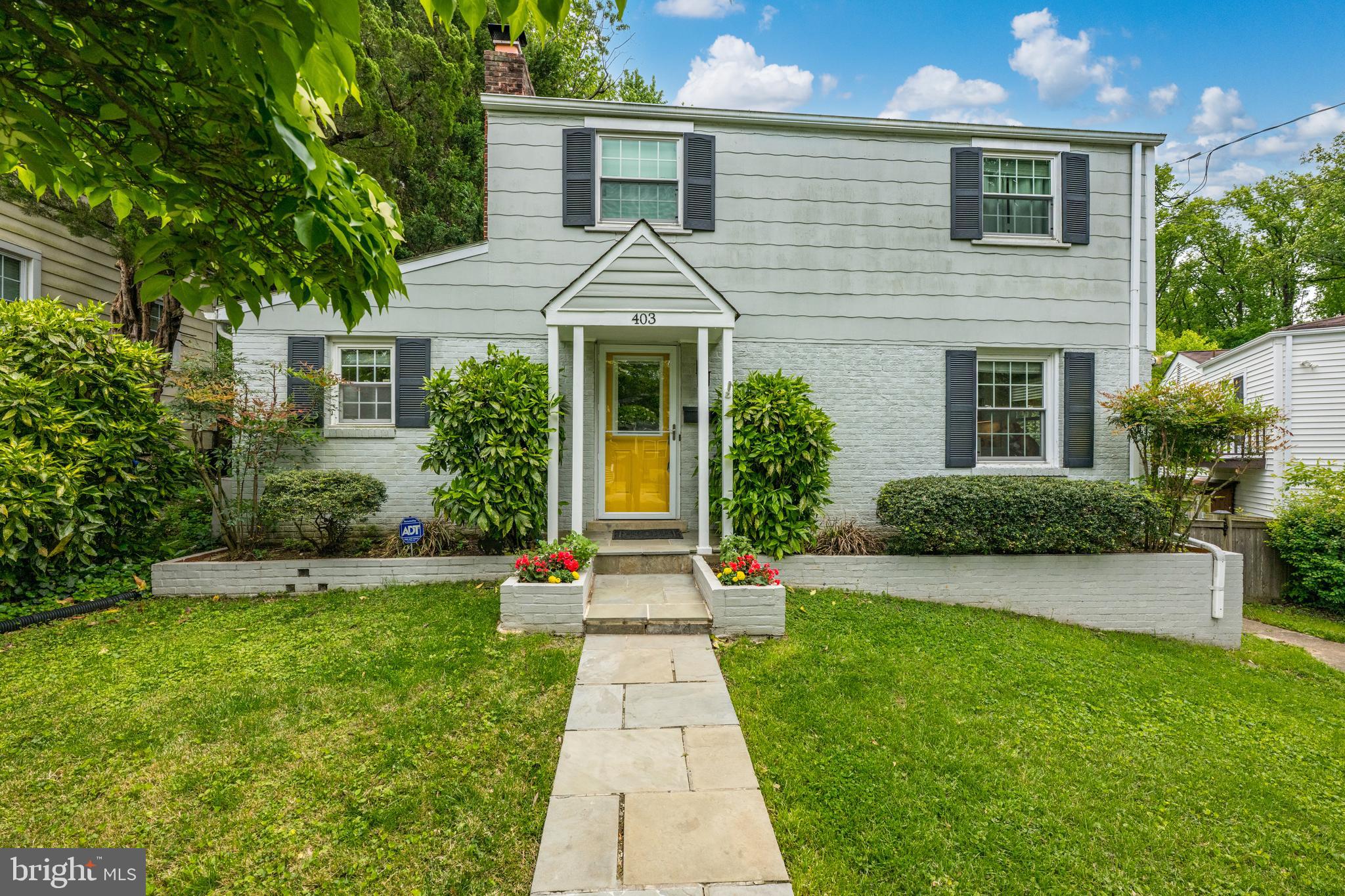 Beautifully updated Colonial offering 4 bedrooms and 2.5 baths in a prime Silver Spring location. A thoughtful renovation has created exceptional open living space on the main level, including a spacious living room with wood-burning fireplace, open kitchen with island, quartz countertops and stainless steel appliances including a 6 burner stove, breakfast nook with built-in banquette, fully renovated powder room with washer and dryer, home office, guest room, and formal dining room with sliding glass doors opening to the rear deck, patio, shed for additional storage, and fully fenced backyard surrounded by mature landscaping and seasonal blooms. Upstairs features three additional bedrooms and a full bath, including the primary suite with a large custom walk-in closet. The lower level offers bonus living space and another full bath, perfect for guests, a playroom, or additional recreation space. Ideally located near Sligo Creek and trails, steps to the Long Branch Creek and Upper Long Branch Park, Woodmoor Shopping Center, Four Corners, and downtown Silver Spring with easy access to shopping, dining, Metro, and major commuter routes.  Please note: Square footage is estimated and calculated by an independent third party; information is deemed accurate but not guaranteed.