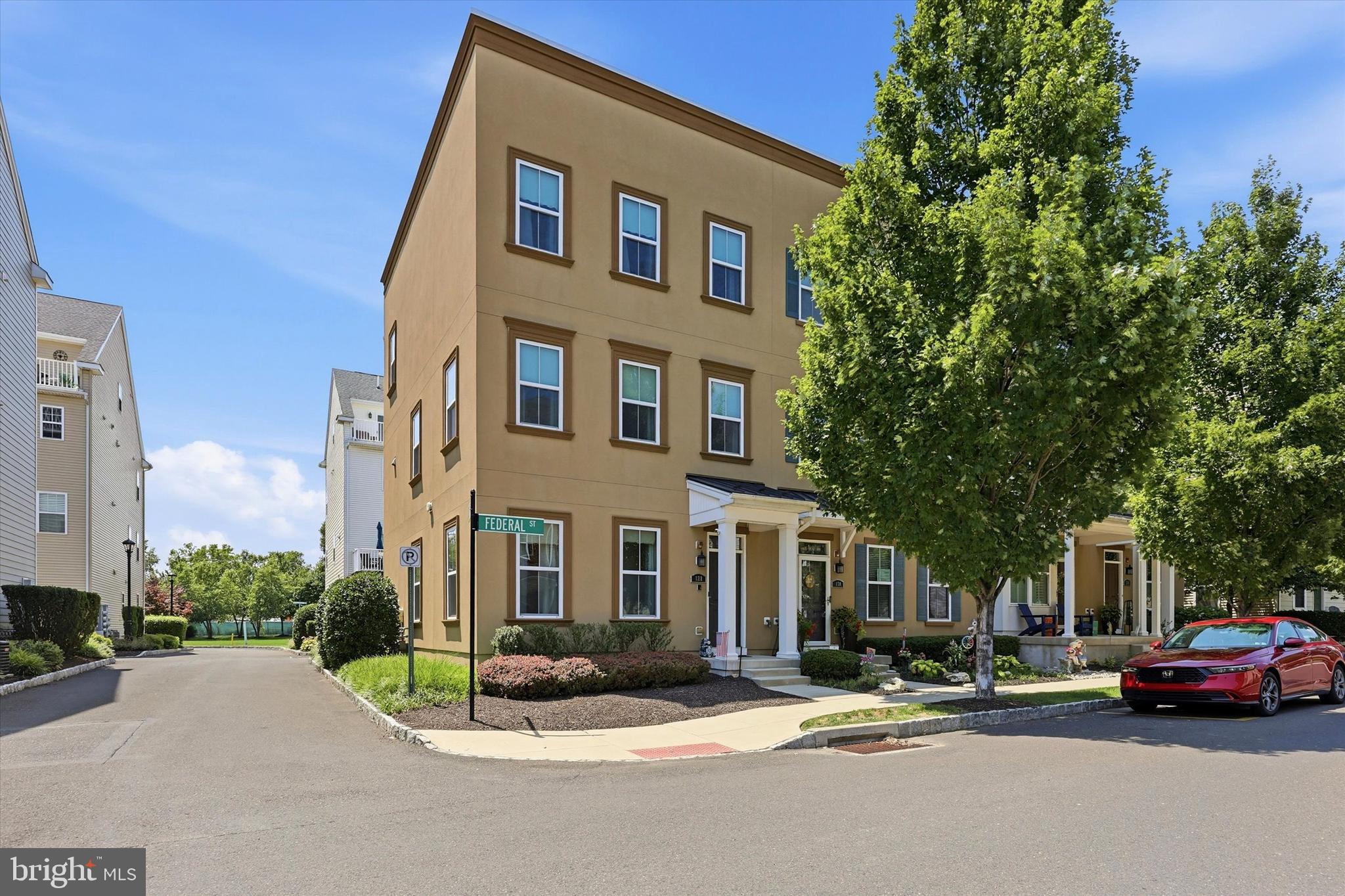 Welcome to luxury living in the highly sought-after Waterside community! This beautiful end-unit townhome offers the perfect blend of style, comfort, and convenience in one of Bucks County's most desirable riverfront neighborhoods. Enjoy the charm of walkable living with a neighborhood café, scenic Delaware River walking trails, parks, shopping, dining, and easy access to major highways and rail service.
Filled with natural light, this move-in-ready home features a versatile first-floor bonus room perfect for a home office, playroom, gym, or fourth bedroom, along with a spacious two-car garage. The open-concept main level showcases a beautifully appointed kitchen with granite countertops, stainless steel appliances, rich wood cabinetry, a large center island, and seamless flow into the spacious family room. Step outside to the composite deck with an electric awning—perfect for relaxing or entertaining. Upstairs, the spacious primary suite offers a walk-in closet and private bath with a double vanity and glass-enclosed shower. Two additional bedrooms, a full hall bath, and second-floor laundry complete the upper level.  Bonus Opportunity: The seller is also offering one of only six detached garages in the entire Waterside community for $45,000. Perfect for additional parking, storage, or a collector vehicle, this is a rare opportunity that seldom becomes available. The current list price reflects the home only and does not include the detached garage (Parcel #02-064-139C322, 144B Federal Street).