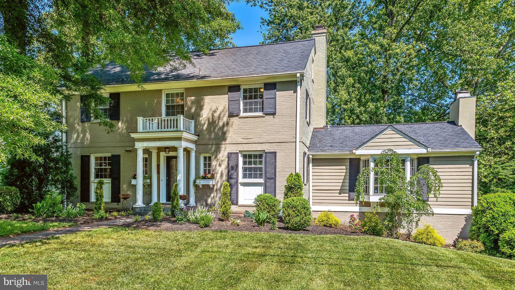 Welcome to this gorgeous sun-drenched and sophisticated remodeled home situated in the exclusive and sought after neighborhood of The Hamlet in Chevy Chase. Sited on a quiet street and a beautiful private lot, this tastefully appointed 5 bedrooms, 3.5 bath home offers excellent spaces for comfortable living and entertaining. The extensive list of features includes a stunning living room with cathedral ceilings and wood beams, a beautiful  gas stone fireplace, large bay window, custom built-in cabinetry with wet bar and a sliding glass door to the amazing wrap-around deck; a formal dining room overlooking the private back yard, a large brick wood burning fireplace and sliding glass door to the deck, ideal for entertaining; a beautiful extensive and open Gourmet eat-in kitchen with a large center island with copious amount of storage space, quartz countertops, stainless steel appliances, tons of cabinet space and a convenient side door to the exterior; a main level light filled office/den with  custom-built cabinetry and a powder room with a pedestal sink. The upper level includes a light-filled master suite with a farm door to the beautiful en-suite bathroom with double sink vanity, a large glass enclosed shower and a walk-in closet with custom built-ins; two additional light-filled bedrooms with hardwood flooring and a generous sized bathroom with a shower-tub combination. The fully finished attic features a bedroom with additional storage area and hardwood floors. The lower walk-out level includes a cozy family room with a brick wood burning fireplace, door to the two-car oversized garage, door to the rear brick patio, an ample full bath with a large shower, a light-filled bedroom and a laundry/utility room. Location just couldn’t get any better than this! Just minutes to downtown Washington, Northern Virginia, the beltway, schools, parks, shopping and restaurants, including the re-developed Chevy Chase Lake area and the planned Purple Line station.