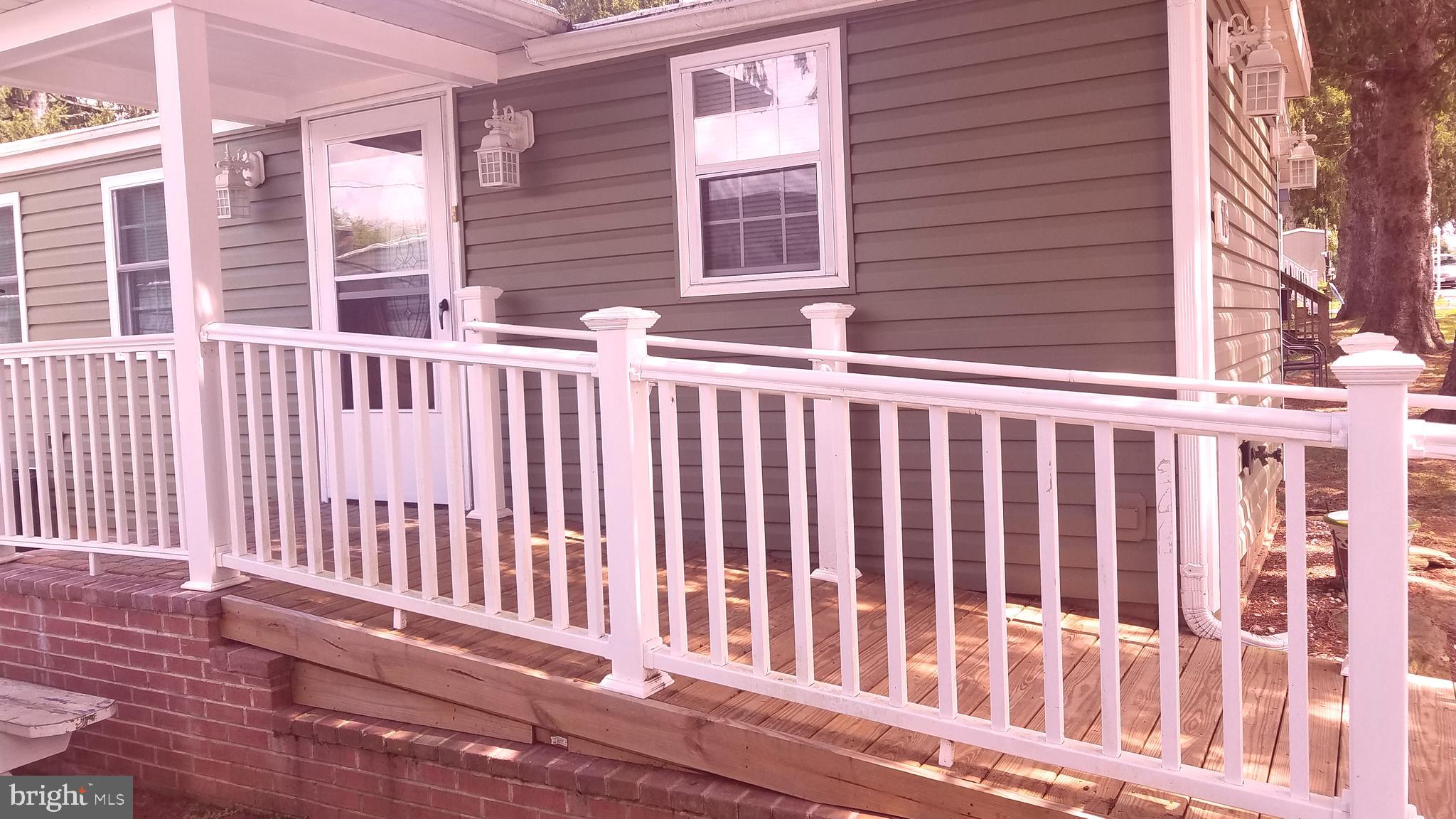 ONE OF A KIND-MUST SEE TO APPRECIATE!!! 1BR, 1BA 12/52 Mobile home for sale in Hillandale Homes Mobile Home Park #1. Kitchen/Living Room Combo, laundry area across from Bathroom with new washer and dryer. Almost all other appliances 2 to 7 years old. Metal roof with silicone paint. Storm door on front door, access ramp t front door , back door has a small deck. Concrete pad for picnic table. 2 Sheds with two parking spaces behind and parking out front also. Immaculate, well kept and maintained. Ground Rent is $625.00 monthly which includes, water, septic, trash removal, snow removal. Property cannot be financed, this is a cash sale.