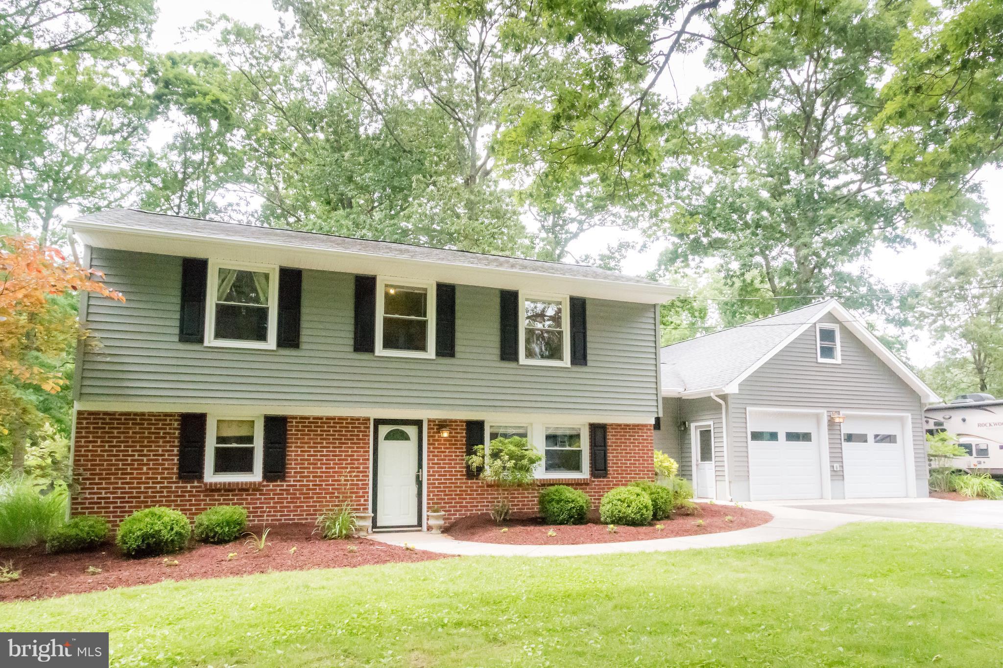 Smartly designed home with open floor plan in North Town Creek.  Updated kitchen w/ corian counters, recessed lighting, prep sink, & tiled floors. Family RM w/ cozy steel lined fireplace & vaulted ceiling. Extra room for den or workout space. Oversized 2 car garage w/ lots of storage above. Peaceful landscaped lot w/ spacious deck, hot tub, & firepit.  Plenty of parking. Call today!