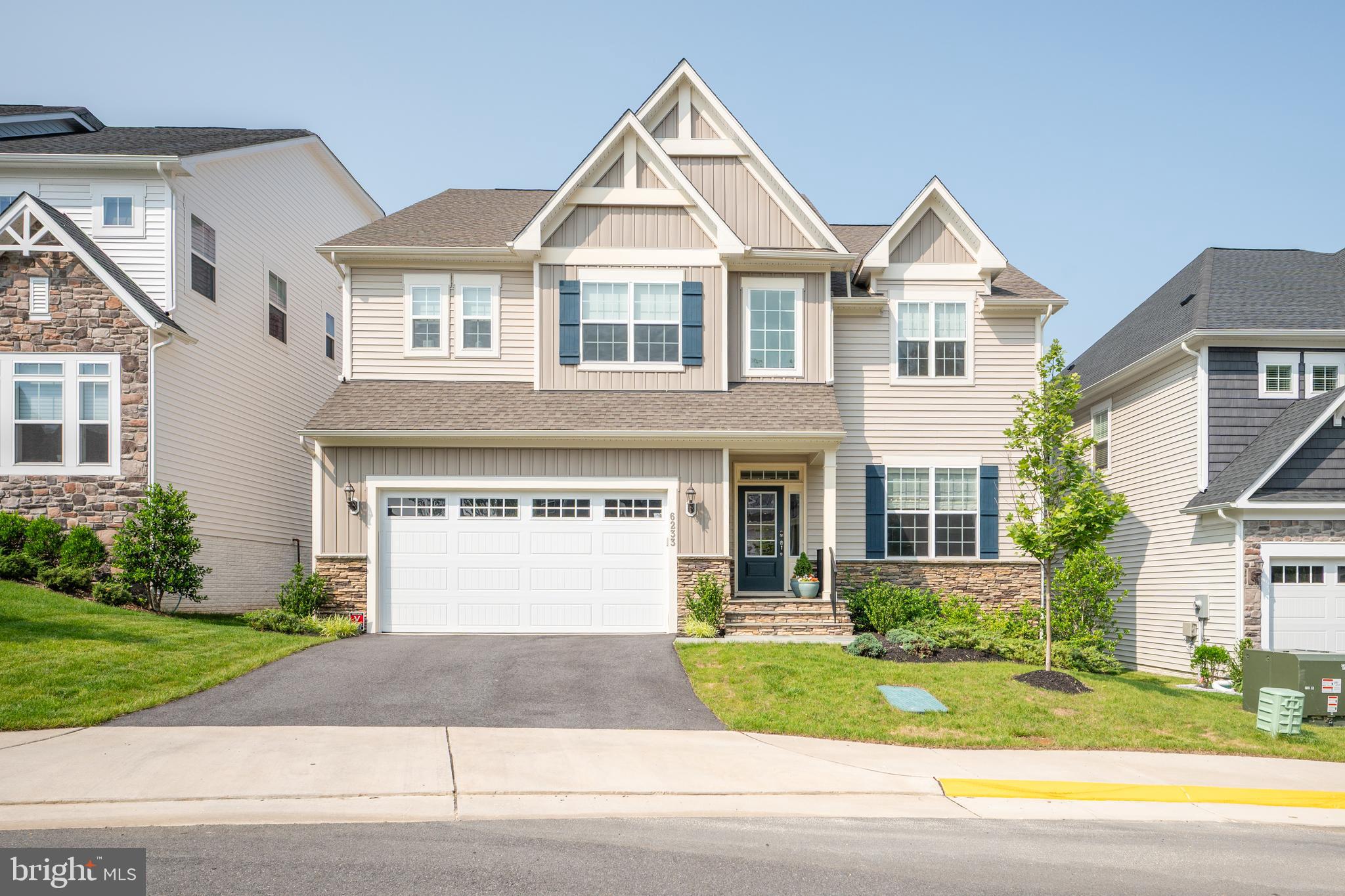 OPEN CANCELLED.    UNDER CONTRACT.    Just three years young with over $200,000 of additional improvements, this exquisite residence in the coveted McConnell Manor community is set in a tranquil, tree-lined enclave within walking distance of sought after West Springfield High School.  Meticulously crafted by Christopher Companies, the desirable Taylor model offers a spacious, light-filled layout designed for both grand entertaining and everyday living. The main level impresses with soaring ceilings, a formal dining room with tray ceiling,  a dramatic great room featuring a gas fireplace and coffered ceiling, a serene sun room, a private office, a sun-drenched breakfast room, and a chef-caliber kitchen adorned with stainless steel appliances, a five-burner gas cooktop, dual ovens, oversized granite island, and custom pantry with built-in organizer system.   Step outside to a low-maintenance Trex deck complete with a built-in grilling station and stairs that lead to a landscaped backyard retreat.  The home enjoys five generously sized bedrooms, each with walk-in closets (all but one), and four and a half luxurious bathrooms. The owner’s suite is a true sanctuary, boasting a spa-inspired bath with deep soaking tub, oversized walk-in shower, dual vanities, and an expansive, fully organized walk-in closet.  The lower-level walk-out continues the home's thoughtful design with abundant natural light, a spacious recreation room with wet bar and table space, an additional bedroom and full bath, a large bonus room, and a well-equipped utility space with tankless gas water heater, Aprilaire whole house system, and second refrigerator.  Additional highlights include Impressive Maple Vista engineered hardwood flooring on both upper levels, designer lighting, custom window treatments, sound system, security system, a two-car garage with Level 2 EV chargers, and energy-efficient construction certified by EnergyStar and the National Green Building Standard.  With access to a private community walking trail nestled within a protected tree preserve, this home offers more than luxury—it offers a lifestyle defined by comfort, craftsmanship, and sustainability.