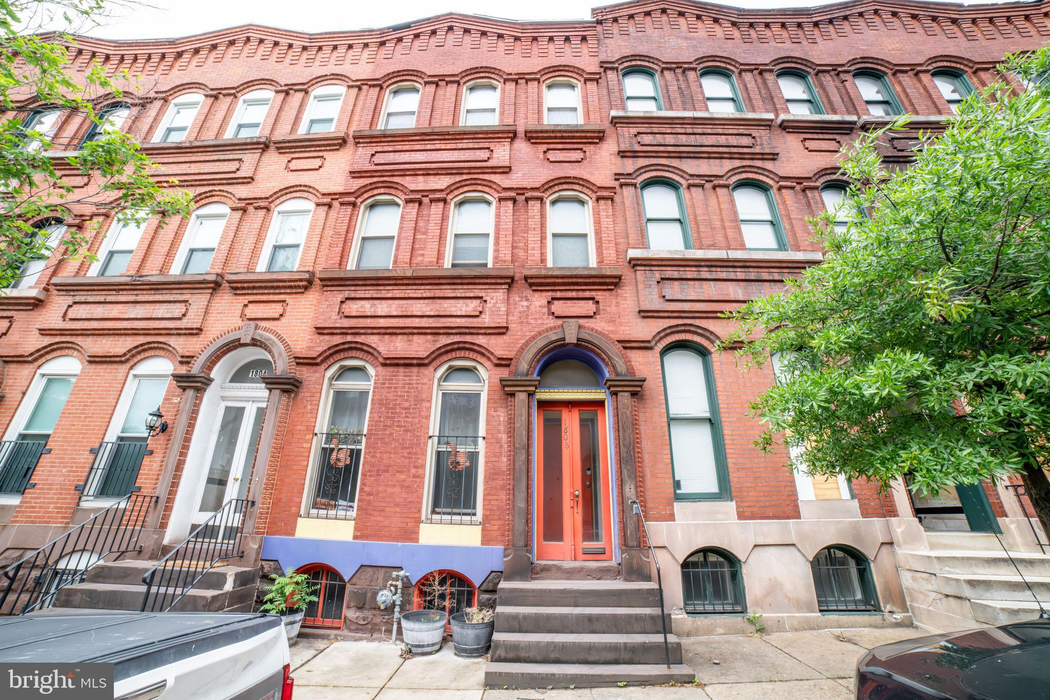 Turnkey 3-unit brownstone in Station North with documented $48,269 T12 gross income and active Baltimore City rental license through January 2028. Three separately metered 1BR/1BA apartments, all updated with stainless appliances, gas ranges, dishwashers, and modern flooring. Each unit independently metered for gas, electric, and water heater. Brand-new roof. HVAC in good working order. Lead paint certifications in place. Rear parking pad. Approximately 3,700 sq ft across three finished levels in an 1890 historic brownstone with original character preserved. Unfinished basement combined with flexible OR-3 zoning supports a future fourth-unit conversion (not currently plumbed); stabilized rents at four units project to roughly $5,900/month. Walking distance to Penn Station (Amtrak Acela, MARC, Light Rail), MICA, University of Baltimore, and Johns Hopkins shuttles. Quick access to I-83 and the Inner Harbor. Full T12 and rent roll available upon request.