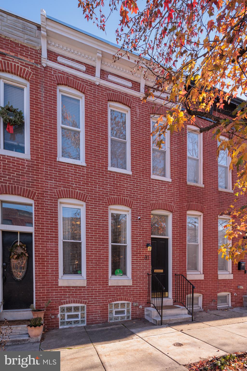 Tastefully renovated, spacious home on a great block in Patterson Park with 2 years of CHAP remaining! This functional, flexible floorplan offers 2 bedrooms with ensuites on the upper level, and a third bedroom/office/recreation space complete with full bath on the lower level. Gleaming hardwood floors throughout the main and upper levels, and new upgraded carpet on the lower level. Dining room features a built-in wet bar great for entertaining!  Kitchen boasts granite countertops, stainless steel appliances, upgraded lighting, plenty of cabinetry and a custom built pantry. Home has been upgraded throughout since the previous renovation. New roof, new trex deck, new tile in bathrooms, upgraded lighting and customized closets just to name a few! Please inquire to listing agent regarding parking options for this property.