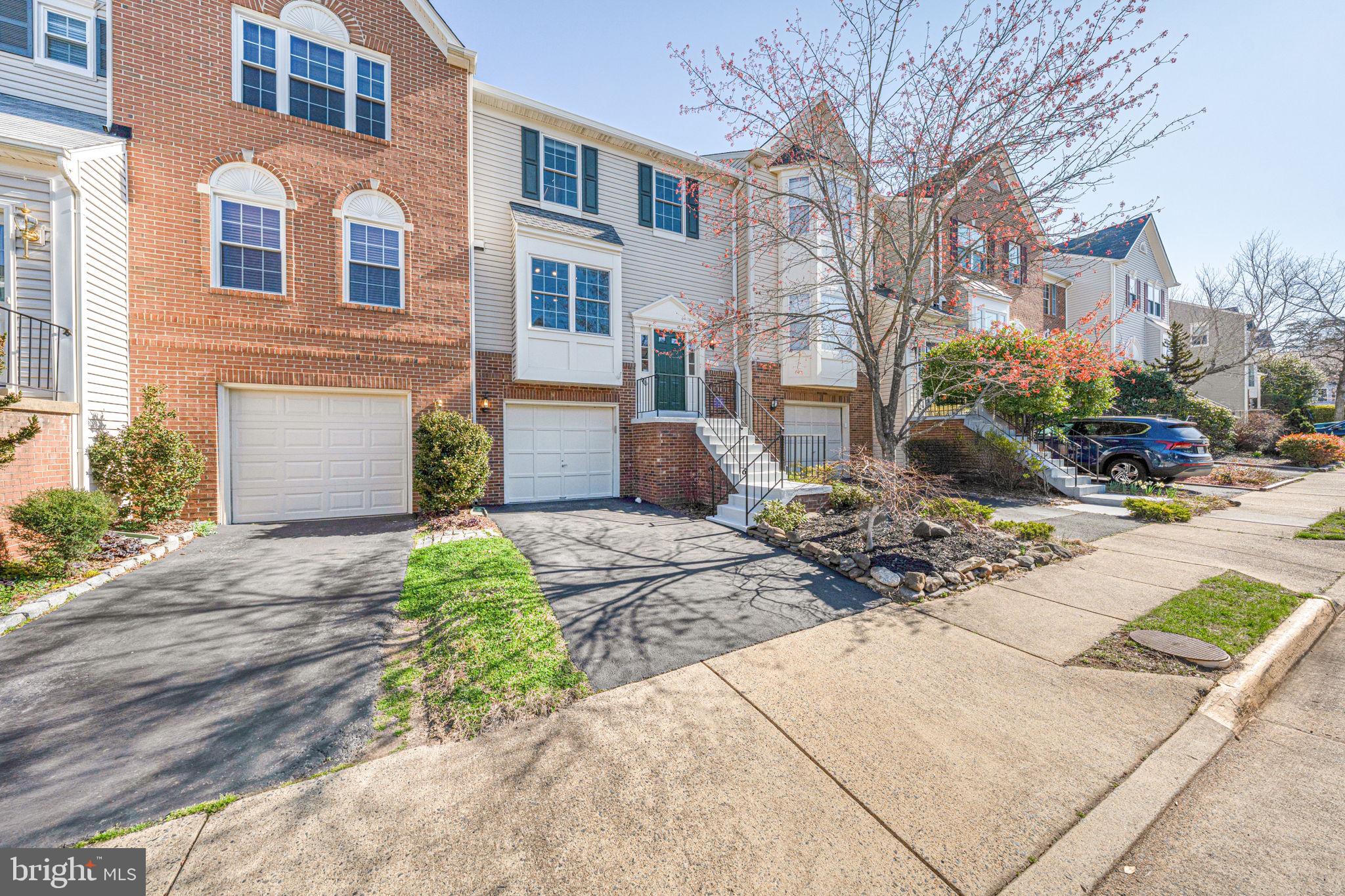 Experience Easy Living in North Hart Run. Step into this updated, light-filled, neutrally painted garage townhome where comfort meets style. Inside, the open main level featuring hardwood floors welcomes you with a bright, upgraded kitchen and a spacious living room with a cozy gas fireplace, ideal for gathering with friends and family. The elegant dining area adds just the right touch of sophistication. Step outside back to a freshly painted main-level deck overlooking a peaceful, tree-lined view and the community’s tot lot—a perfect spot to unwind or entertain. Upstairs, wall-to-wall carpeting (upper level and basement, 2020) takes you to the primary suite with two walk-in closets and a newly renovated bathroom for a moment of well-deserved luxury. Two additional bedrooms share another beautifully updated bath, giving everyone their own space. And with a brand-new roof and gutters (2024), all new windows (2020), newer A/C (2020), and reliable furnace (2018), you’ll have added peace of mind (and the roof, gutters, and windows come with transferable warrantees). So many thoughtful upgrades. Head to the lower level for even more living space, complete with a second gas fireplace, full bathroom, laundry, one-car garage, and walkout access to the lower-level deck and fenced backyard. Outside your door, North Hart Run offers a pool, tennis courts, and tot lots, creating a friendly community vibe. If you’re looking for a home that strikes the perfect balance between comfort and convenience, this is it. Schedule your private showing starting 3/28/2025 and make this inviting townhome your own. More photos coming soon! Offer deadline 7PM Sunday, March 30.