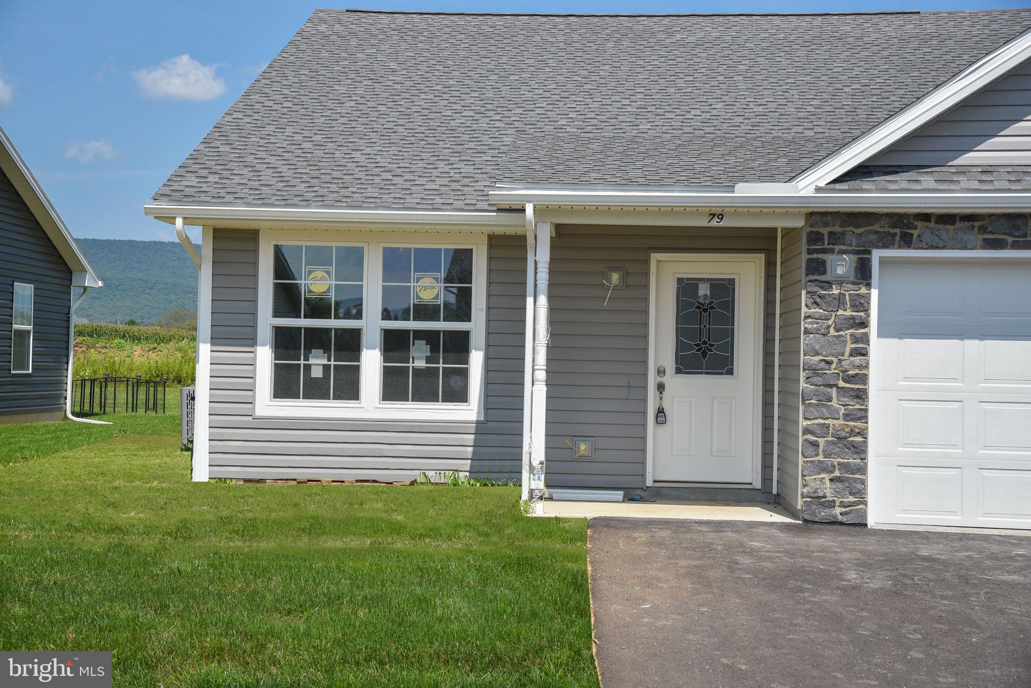 Welcome to beautiful Shalamar Gardens!  This brand new construction would be awesome with a very short commute to State College or an investment property or for PSU events.  Fabulous neutral decorating and fantastic views. The fresh air and beauty of the mountains abounds in this spectacular neighborhood just a short drive to State College.  This 1/2 duplex features 3 bedrooms, 2 full baths, laundry, patio and garage all on one-floor living.  The spacious kitchen with granite countertop/dining/ great room leads to a nice private rear yard for your enjoyment.   Paved driveway is also included.  There is a one time $75 fee due at settlement.  Don't miss the opportunity to own one of these gems--call for a tour today!   Open concept great for entertaining with luxury vinyl tile, stainless steel appliances and granite countertops.  Very easy to finance because you own your very own land!