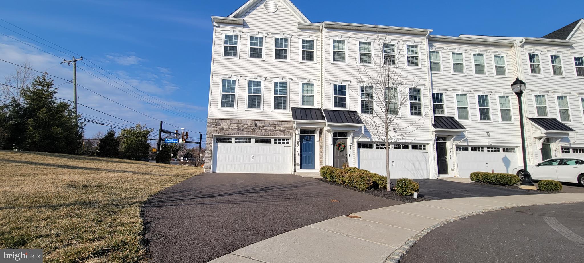 Don't Miss Out on This Unique 4-Bedroom, 3.5-Bathroom End-Unit Townhouse!
This stunning end-unit townhouse offers a rare opportunity for luxury living in the sought-after High Grove community. Featuring a long driveway, you can comfortably park up to 4-5 cars, plus enjoy the convenience of a 2-car attached garage. Ample 15-20 visitor parking is also available right in front of the property. Step into an open-concept floor plan with soaring 9-foot ceilings, an abundance of natural light, and elegant hardwood floors throughout the living areas. The upper level and basement are carpeted for added comfort. The gourmet kitchen is a chef's dream, boasting 42-inch white cabinetry, granite countertops, a stylish tile backsplash, recessed lights, stainless steel appliances, and a spacious granite center island.  The fully finished walkout basement includes an additional bedroom, a full bathroom with bathtub and windows, making it perfect for an in-law suite, home office, or guest room. Enjoy your mornings or evenings on the deck, perfect for coffee or unwinding with a drink. The Owner's Suite is a peaceful retreat, complete with a soaking tub, stall shower, granite vanity, tiled floor, and two spacious walk-in closets. The hallway bathroom is also enhanced with a granite vanity, sink, and tiled floor. This home is conveniently located near Rt. 611, Valley Square Shopping Center (3 min from the property), and a variety of dining and shopping options. Schedule your tour today—this one won't last long!