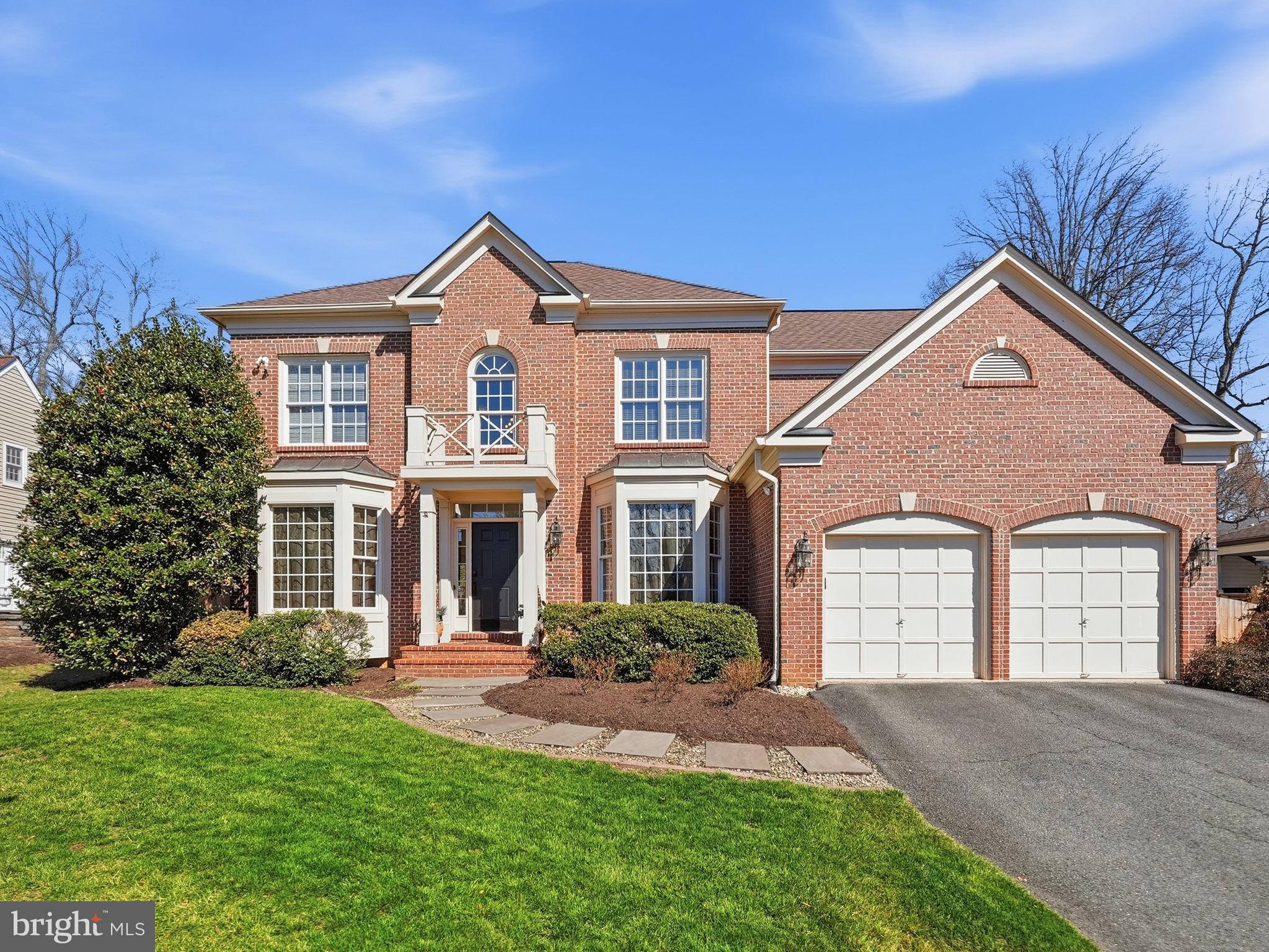 Nestled on a tranquil street, this beautifully maintained brick-front colonial is the perfect blend of classic elegance and modern comfort. From the moment you step inside, you'll be greeted by an abundance of natural light streaming through the large, bright windows, creating a warm and inviting atmosphere.
The main level boasts a formal living and dining room, a family room perfect for gathering while enjoying the fireplace or picturesque views of the stunning, private backyard, and a convenient study for work or relaxation. Step outside to your own personal oasis—a serene patio perfect for entertaining or unwinding amid the lush surroundings.
Upstairs, you'll find four spacious bedrooms, including a luxurious primary suite featuring a three-sided fireplace, an expansive walk-in closet, and a relaxing retreat. A charming princess suite adds an extra touch of comfort for family or guests and two additional bedrooms share a hall bath. 
The lower level is an entertainer's dream, complete with a recreation room, exercise room, hobby room, a dry bar equipped with a mini-fridge and ice maker, and a full bath. With a walk-up exit to the backyard, this level seamlessly connects indoor and outdoor living.
Every detail of this home has been thoughtfully designed to create a harmonious living experience. Don't miss the chance to make this extraordinary property your own! Convenient  to multiple commuter routes and the Mosaic District where you can enjoy shopping, movies and dining!