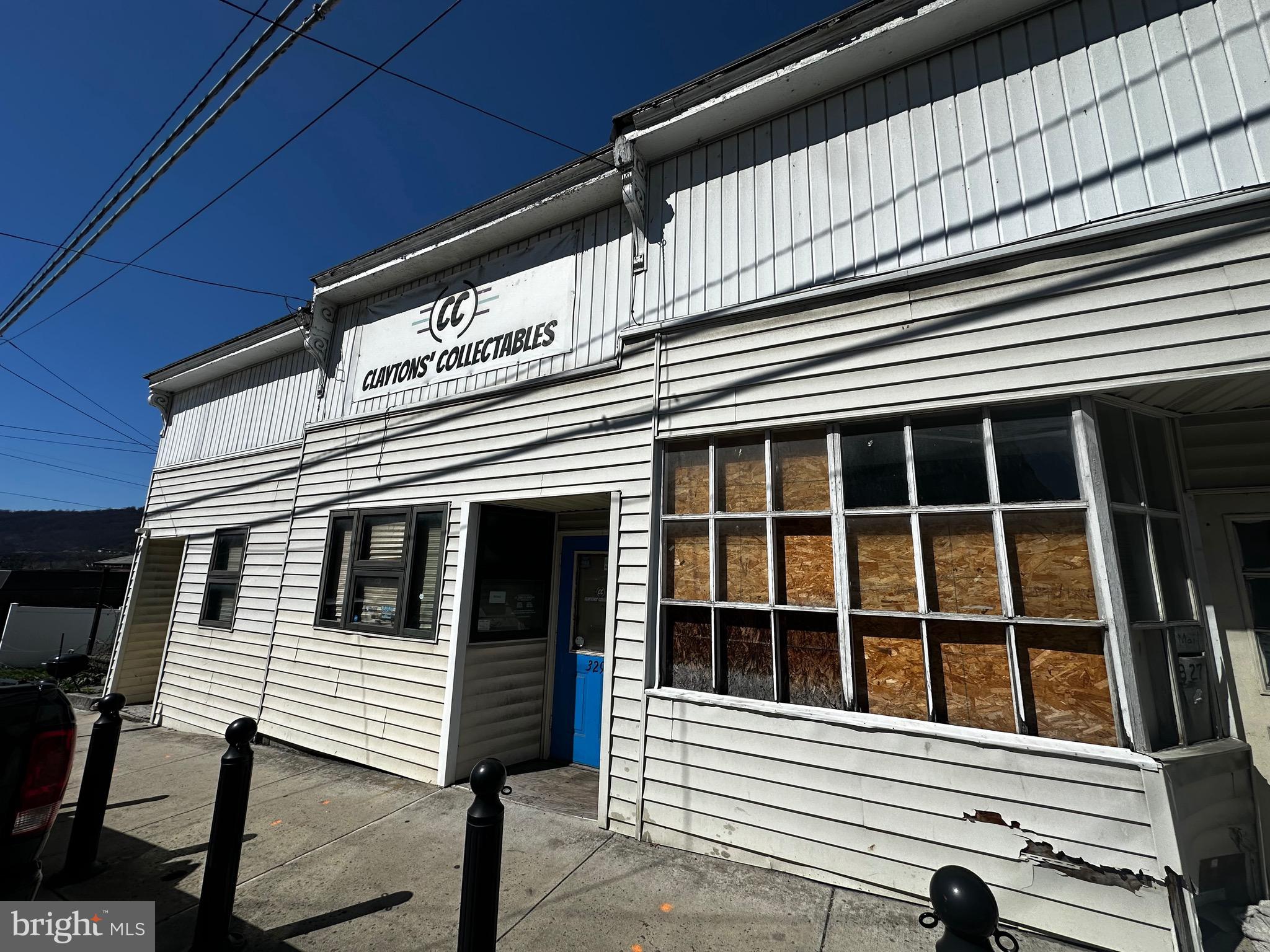Versatile commercial space in Cumberland.  Unlock the possibilities with this unique commercial property formerly home to a successful collectibles store. This flexible space offers three distinct area that can be utilitzed together for one cohesive business or separated for mutiple uses. 
The building does require some updates and improvements offering a great opportunity to customize the space to your needs. 
With the right vision, this property can truly shine.