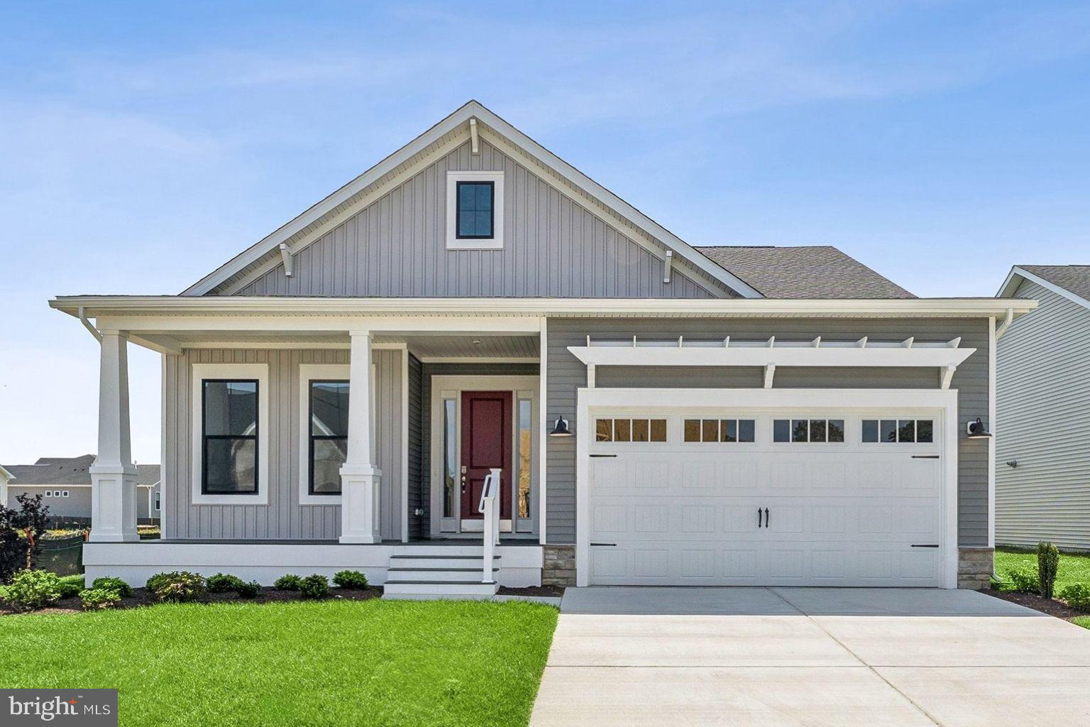 Prime East of Route 1 coastal location - minutes to beaches, trails, and the best of Lewes.

New Construction • Delivery Late Spring 2026

Welcome to The Eastwood—a charming, cottage style ranch home offering true first floor living in one of Delaware’s most exclusive, award winning coastal communities. Thoughtfully designed with 1,780 square feet of refined comfort, this 3 bedroom, 2 bath residence blends modern luxury with warm, inviting character.

Step inside to upgraded LVP flooring throughout, upgraded lighting packages, and an open concept layout anchored by a stunning gourmet kitchen. Enjoy upgraded quartz countertops, a large center island, stainless steel appliances, built in double wall ovens, built in cooktop, French door refrigerator, stainless steel appliances and a farmhouse sink. The adjacent great room features a cozy fireplace and opens seamlessly to the rear screened porch and a 12’ x 14’ exterior deck—perfect for relaxing or entertaining.

The upgraded primary suite is a true retreat, showcasing a spa inspired bathroom with a frameless glass shower enclosure, tile to the ceiling, a tiled pan floor, and three shower heads for a luxurious experience. Additional highlights include a dedicated laundry room with cabinet package and utility sink, natural gas heat, gas cooking, a tankless Rinnai hot water heater, and a 4’ conditioned crawlspace for enhanced efficiency and storage.

Outside, enjoy a covered front porch and a homesite positioned within a serene, natural setting—surrounded by open space, wildflower plantings, and thoughtfully preserved landscapes.

Unmatched Coastal Location:
Just a 15 minute bike ride to the beach, ½ mile to the Lewes–Georgetown Bike Trail, and 1 mile to the Lewes/Rehoboth Canal. Minutes from Cape Henlopen State Park, the Cape May–Lewes Ferry, and all the charm of historic Lewes. Ideally situated east of Route 1 for effortless coastal living.

Resort Style Community Amenities:
Live in the 2025 Regal Award–Winning Community of the Year, offering an unparalleled lifestyle:

• Zero entry resort style pool & hot tub
• Pickleball courts & a tennis court
• Community garden
• Outdoor pavilion, grill areas & fire pits
• Horseshoes, shuffleboard & bocce ball
• Tot lot & outdoor workout space
• Nature trails, wildflower meadows & honey bee hives
• Expansive great lawn for events
• Lifestyle Director coordinating yoga, Pilates, Zumba, strength training, cooking demos, lunch and learns, wine & beer tastings, brewery tours, live music, and more

A Rare Opportunity
Homes here are selling fast with limited availability. This highly sought after, one of a kind coastal community offers an unmatched blend of luxury, nature, and lifestyle. Don’t miss your chance to own The Eastwood—a brand new home in an award winning setting, ready just in time for Summer 2026.

For a full list of included features, please contact our sales representatives.
Photos are for illustrative purposes only and may not represent the exact home or finishes available.