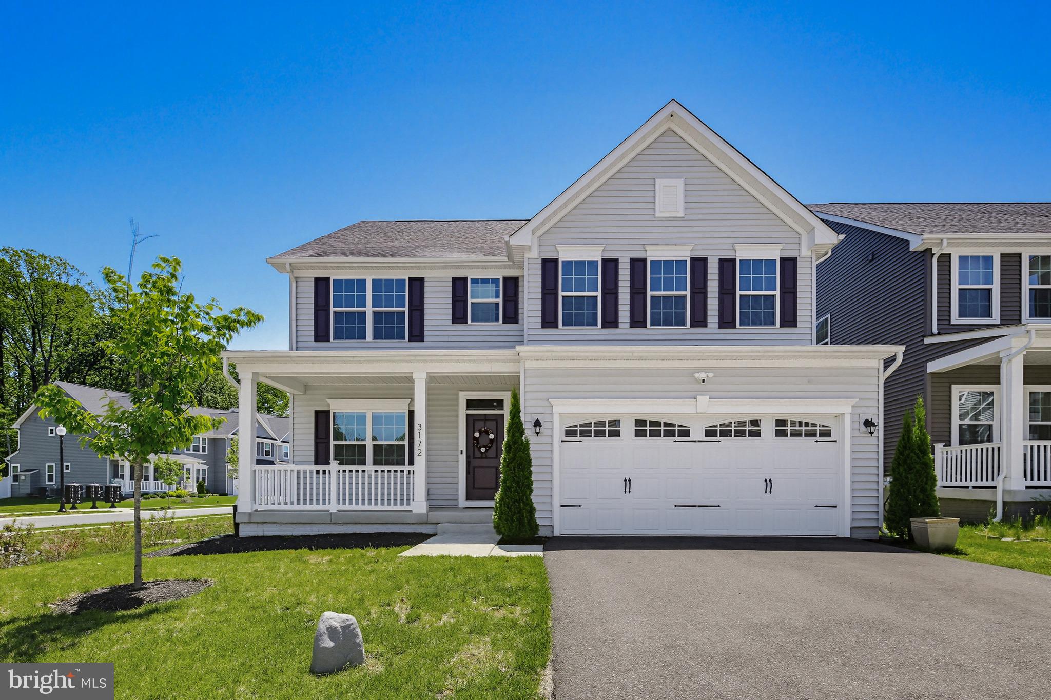 Enjoy all of the benefits of new construction without the wait or added costs. 3172 Dodder Way offers the perfect blend of functional living space and resort-style amenities in the highly sought-after Two Rivers community. Built in 2022 by Ryan Homes, this Hudson floor plan features almost 4,000 square feet with 4 bedrooms, 3.5 baths, and a 2-car garage. The main level offers exceptional flexibility with both a private home office and additional flex space with built-ins, ideal for a playroom, or formal sitting room. The open-concept layout flows seamlessly into the main living areas, with a dream Chef’s kitchen centered around it all. Finished with quartz countertops, espresso cabinets, full size pantry and a stainless-steel appliance package. Upstairs, the spacious bedroom level provides comfortable accommodations throughout. The Primary bedroom showcases a tray ceiling, two massive walk-in closets and a luxurious en-suite. Three more bedrooms, a shared hall bath and dedicated laundry room round off the upper floor. The finished walk-out basement expands the home’s functionality with a secondary lounge area, full bath and huge storage room. Outside, the homeowners have enhanced the property with a covered deck, paver patio and fully enveloped the lot with a privacy fence. Residents of the Two Rivers community enjoy access to pools, clubhouse amenities, fitness facilities, walking trails, playgrounds, and more, all while being conveniently located near major commuter routes, shopping, dining, and everyday conveniences. Schedule your private showing today!