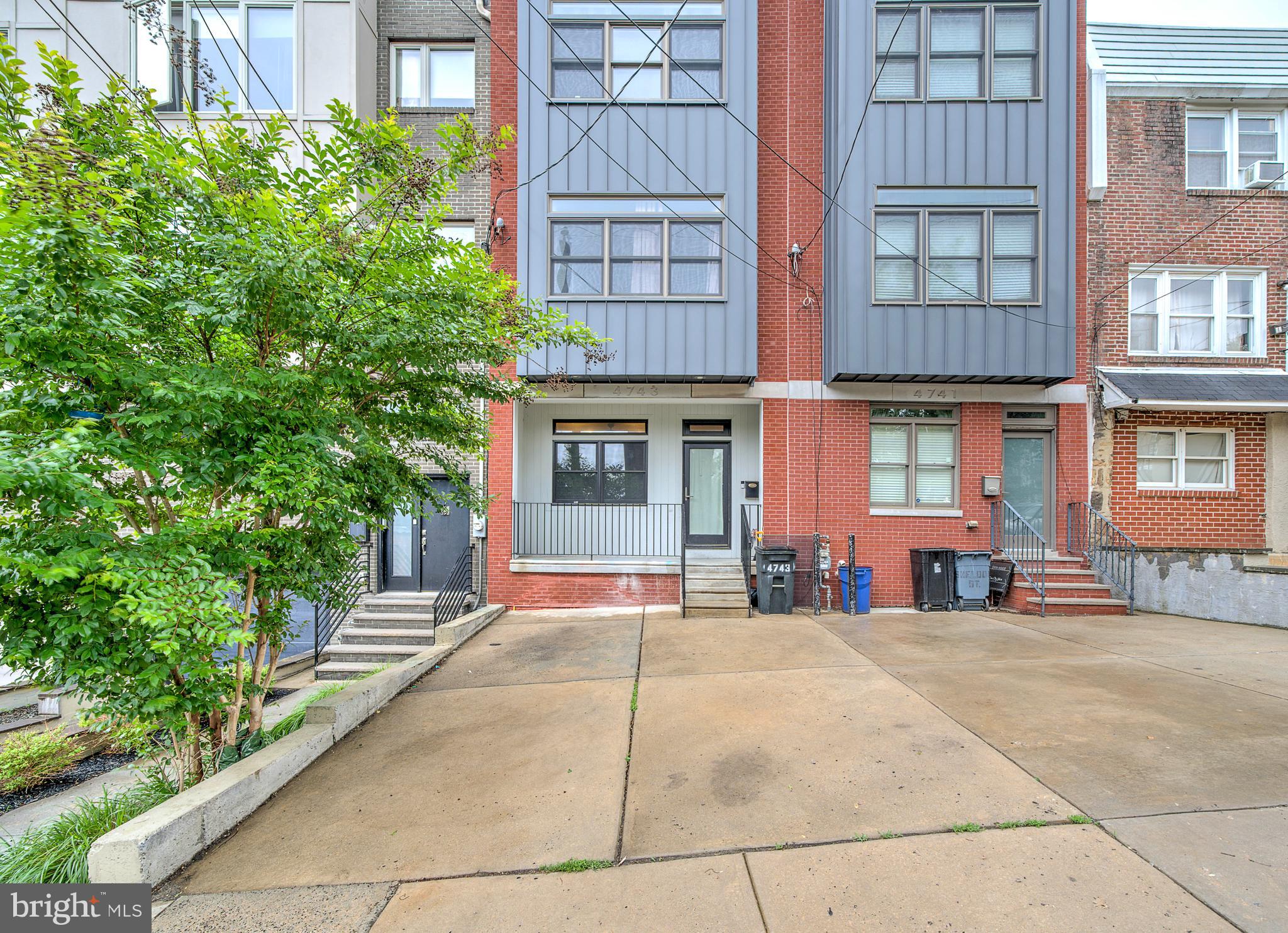 Welcome to 4743 Sheldon Street! A spacious and thoughtfully upgraded home in the heart of Manayunk offering above grade plus a fully finished lower level.  This property stands out with its functional layout, abundant storage, and rare outdoor space. The main level features an open and light-filled living area anchored by a well-appointed kitchen with granite countertops and ample cabinet space-ideal for both everyday living and entertaining. The finished basement expands the home’s versatility, complete with luxury vinyl plank flooring and a built-in bar, creating the perfect space for hosting or relaxing. From this level, step directly into a generously sized backyard-an uncommon find in Manayunk-finished with pavers, turf, and a space for a potential garden, offering low-maintenance outdoor living with exceptional hosting potential. Upstairs, the second floor offers well-proportioned bedrooms, including one with a walk-in closet and another with a reach-in closet. The third-floor suite serves as a private retreat, featuring a large bedroom, both walk-in and additional closet space providing a reach-in closet, and a beautifully finished bathroom highlighted by modern tile work. Just outside, a private balcony extends the living space even further, overlooking the backyard below and creating a perfect setting for morning coffee, evening relaxation, or intimate entertaining. This home has been enhanced with numerous upgrades, including custom closet systems in the primary bedroom with a lifetime warranty, updated bathroom finishes, a newer balcony with warranty, and a roof treated with a silicone coating system. Additional improvements include a tankless hot water heater, newer Samsung dishwasher under warranty, and recently installed garbage disposal-providing both efficiency and peace of mind. Conveniently located just minutes from Main Street, with easy access to dining, shopping, and major routes, this property offers a unique combination of space, upgrades, and location.