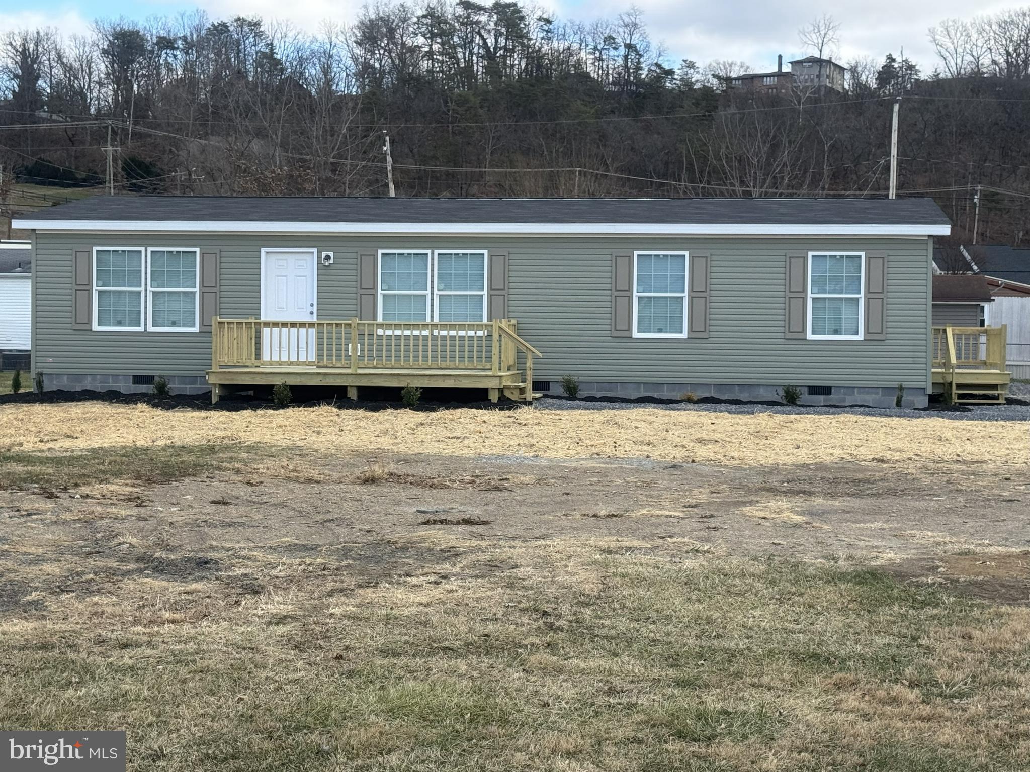 This is the perfect location. It is within walking distance of Pilgrim's Pride.  Local school system bus stop with in  feet of the driveway.  A "never lived in" 2026 3 bedroom 2 bath home in Moorefield.  This new home is on .19A lot on Chipley Lane.  This home is all electric with central a/c.  There are 2 decks surrounded by a well manicured lawn. Two car parking on stoned driveway. Very spacious kitchen with walk in hidden pantry. There are to many amenities to list.  This is a must see to appreciate home.
