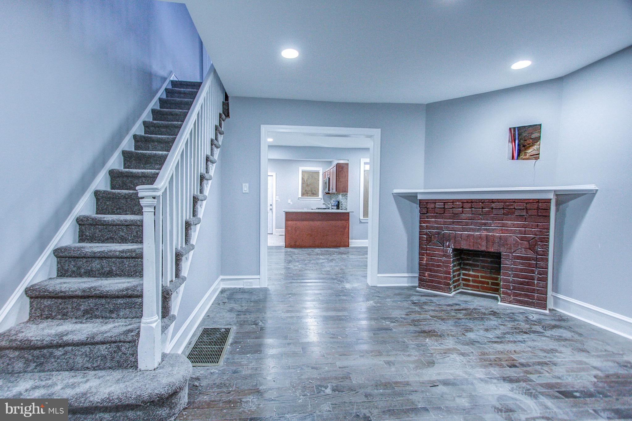 The next best starter home has just landed on the market! 2611 S Bialy Street has a miniature front facing green space and accompanying quaint patio strip for trash & recycling storage. Enter into a fully loaded straight thru home that has been updated for today s buyers. Neutral toned wooden floors and paint highlight the living room and connecting dining room space. A nostalgic brick mantle adds to the original character and decor throughout the home. The dining room space is adjacent to the upgraded chef s kitchen that boasts a pristine set of amenities such as new stainless steel appliances, matching granite countertops and backsplash, and a set of rustic wooden cabinets. Upstairs the coziness continues as you explore three bedrooms, including the front facing master bedroom with three side by side windows to add in that extra dose of sunlight. Neutral carpeting and a new coat of paint added have splashed to the walls throughout this landing. A full sized basement is at your disposal for additional storage and living space. Located on the edge of Delaware and a hop skip away from all the buzz and excitement of Center City - this home could be your ticket to your next adventure.