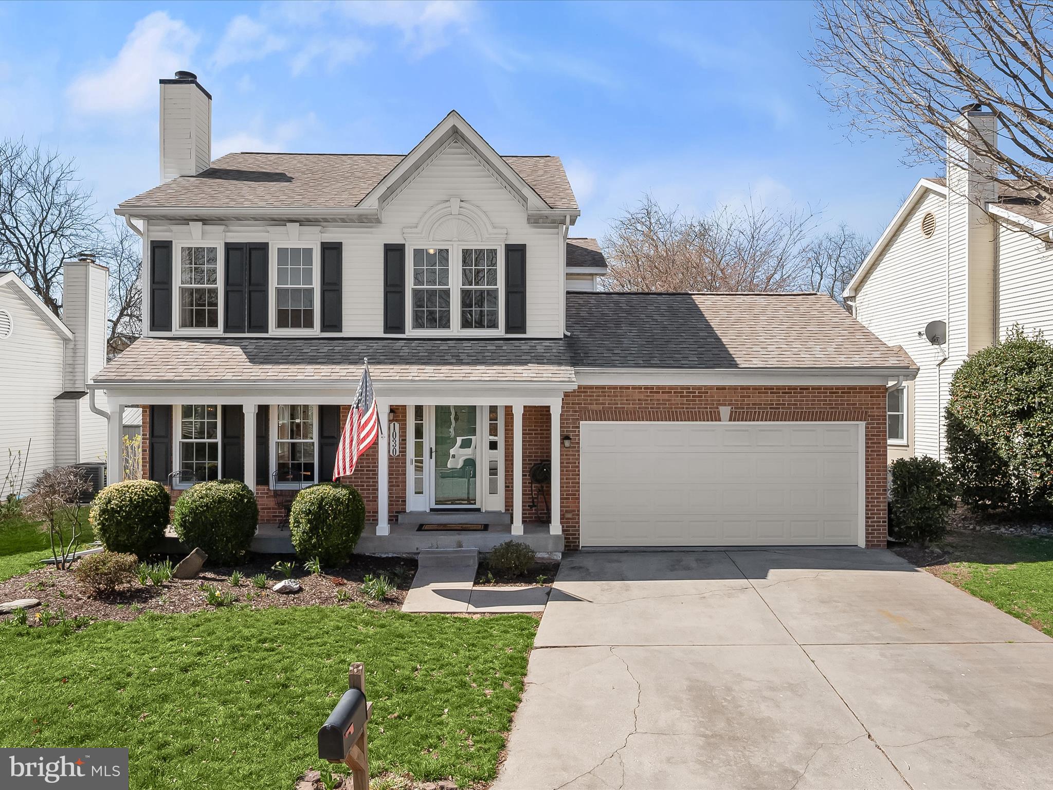 Nestled in the charming Overlook community of Frederick, 1030 Chinaberry Drive is a gorgeous colonial with an impressive list of recent updates. Step into the welcoming foyer, leading to a spacious living room adorned with gleaming hardwood floors, elegant crown molding, and a cozy fireplace. The light-filled dining room flows seamlessly into the eat-in kitchen, featuring sleek stainless steel appliances, decorative backsplash, an apron sink, center island with a cooktop, wall oven, and a breakfast bar. From here, enjoy direct access to the screened-in porch perfect for relaxing or entertaining. A convenient powder room and garage access complete the main level. Upstairs, the primary suite boasts soaring vaulted ceilings and an en-suite bath with dual vanities, skylight, and a luxurious soaking tub. Two additional bedrooms and a full bath provide ample space for family or guests. The lower level offers a fantastic family room with a projector for movie nights, an office area separated by a privacy screen, full bath, laundry room, and plenty of storage. Outside, unwind on the covered front porch or the serene screened-in porch overlooking the backyard that backs to trees. Notable updates include new windows and appliances (2024), washer and dryer (2023), screened-in porch with a ceiling fan (2021), and roof (2016).  Only two miles away from down town Frederick!