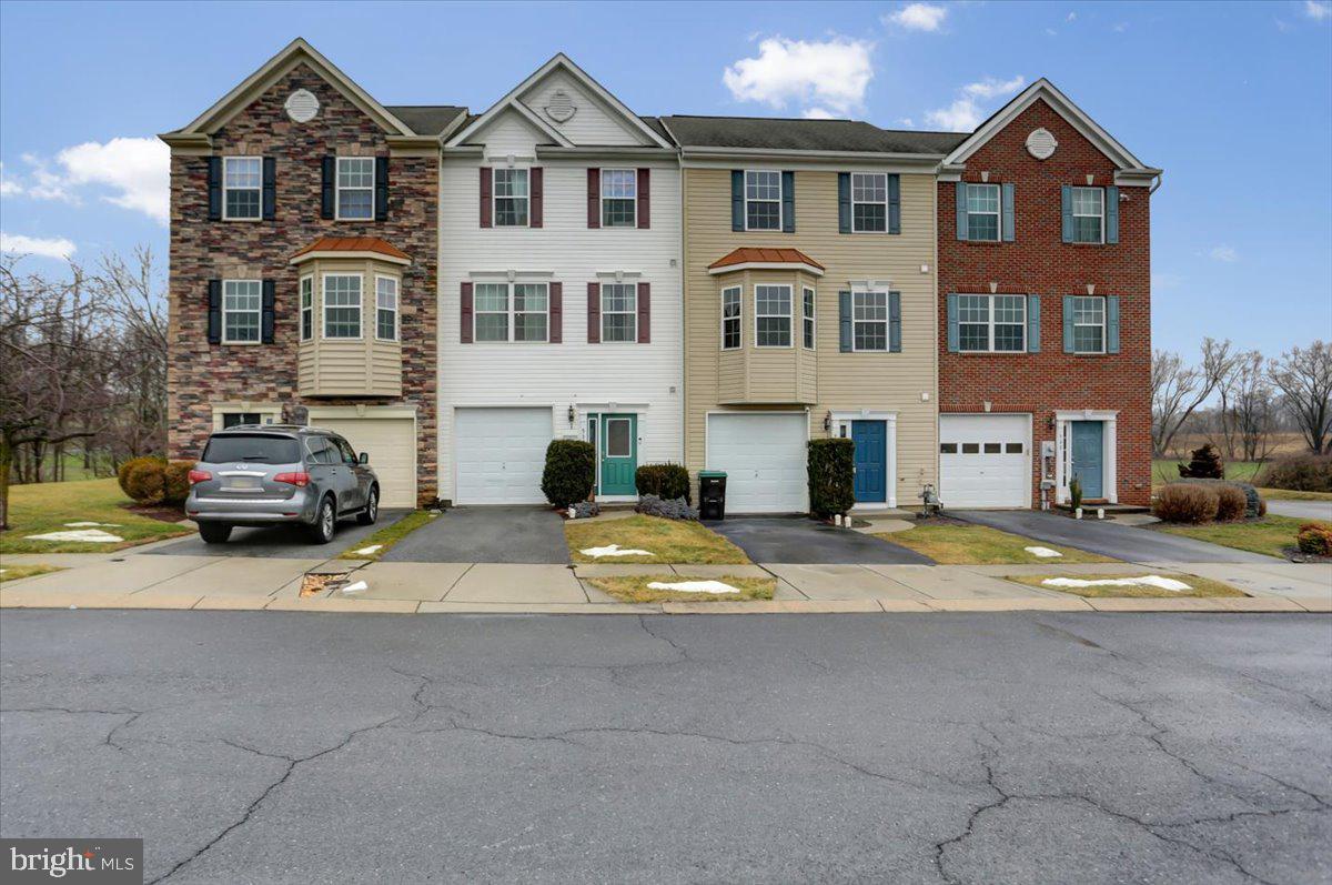 Great townhome in Birmingham Estates! Why wait for new construction?  This 3 bedroom townhome offers lots of extra bump outs plus some awesome outdoor entertaining areas as well.  There's a bathroom on each level which is super convenient!  The entry level has a nice large foyer area along with a half bath, closet, and garage. Beyond the foyer is a large office space/bonus room which leads to the backyard! Up the stairs you will find a large living room with half bath and another storage closet.  The kitchen has so much counter and cabinet space plus a pantry tucked into the corner.  There is an eat in dining area and then a bonus room that's perfect for a coffee bar or sunroom furniture because of all the natural light.  From there you can walk out to the back deck with views of the stream and woods.  Up the stairs you'll find the primary suite which has a large walk in closet and attached full bath.  There is also a full bath in the hall and 2 good size bedrooms with plenty of closet space.  Seller has made some nice upgrades such as overhead lighting and ceiling fans in all the bedrooms, gutter guards, and more! Schedule your tour today!