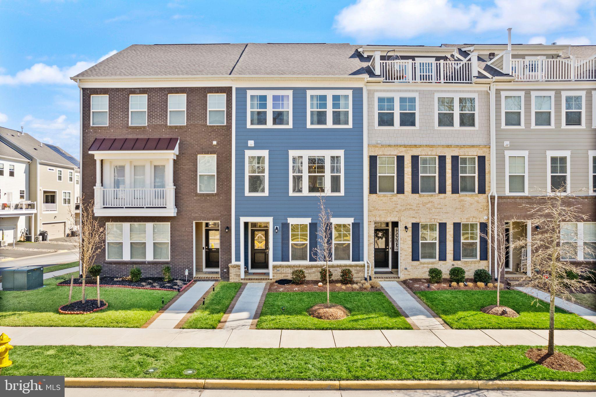 Welcome to this beautiful 4 level home in Potomac Shores on a premium lot!  Built by Beazer Homes in 2020, this townhome with a 2 car garage offers the full package. The main level boasts a fantastic open floor plan with a very spacious main living room bathed in natural light.  Step out the door and enjoy a quaint lovely deck space!  Back inside, you'll be in heaven with a gorgeous eat-in kitchen with upgraded cabinets and a massive kitchen island!  Heading upstairs onto the bedroom level, you'll find 3 bedrooms and 2 full bathrooms, including the perfect primary suite!  The bedroom has space for a full setup - king bed, nightstands, dressers, chairs, and more!  The primary bathroom is a stunning white and comes equipped with a double vanity, standup shower, and oversized walk-in closet.  Bonus, you'll have laundry right outside of the bedroom for easy access!  Upstairs on 4th level is the loft - spacious, open, and bright!  You can also step out onto your beautiful terrace and soak in the beauty of Potomac Shores - perfect for grilling and chilling!  Downstairs you'll find a 4th bedroom that could easily double as an office, or workout space!  The icing on the cake is the location - Potomac Shores is one of NoVA's premier neighborhoods, and we all love being right by the water!  You'll have access to incredible amenities, including 3 pools, epic fitness barn, kids club, demonstration kitchen, clubhouse, golf course (additional fees apply), sports complex, gorgeous walking trails, community garden, and more. Also, the VRE is under construction so you'll soon have even easier commuter access!  This home truly has it all, so be sure to come see it for yourself!