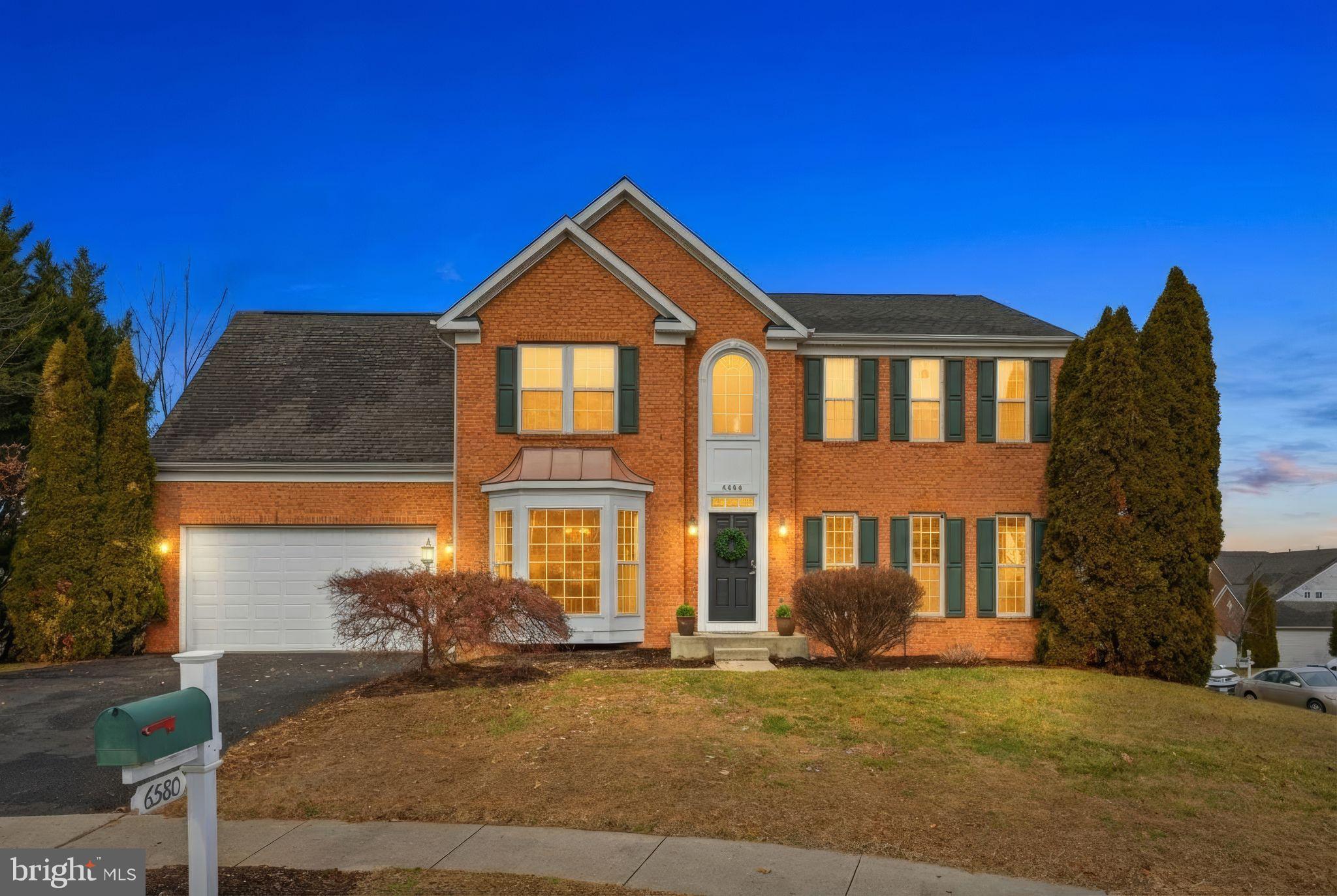 This thoughtfully designed home offers a rare and highly desirable layout with five true bedrooms above grade and six legal bedrooms total, providing exceptional flexibility for today’s buyers.

The main and upper levels feature five full bedrooms above grade—an increasingly hard-to-find configuration that appeals to buyers who prioritize everyday living without relying on basement space. The fully finished walk-out lower level includes a sixth legal bedroom, full bath, laundry, and a separate true office, creating outstanding flexibility for extended living, remote work, or guest accommodations.

The open floor plan is anchored by an updated kitchen featuring quartz countertops, a built-in coffee bar, and a spacious morning room that brings in abundant natural light. The same quartz is carried through to the fireplace surround, creating a cohesive and polished look. The main-level living room features a gas fireplace, adding warmth and functionality to the central gathering space.

Additional highlights include a two-car garage, a newly added deck, paint and flooring updates that enhance both comfort and presentation.  Primary walk in closet has custom organizer.  6th Bedroom and full bath on the lower level, Craft room, Laundry, Recreation room, walk out rear exit.

Situated in a private location at the dead end of Ashby Grove, the home benefits from minimal through traffic while still offering convenient access to local amenities and commuter routes. With its rare bedroom count, flexible layout, and thoughtful updates, this home is especially well suited for multigenerational living, work-from-home households, and buyers seeking space without sacrificing above-grade functionality.  24HR notice needed for viewing.