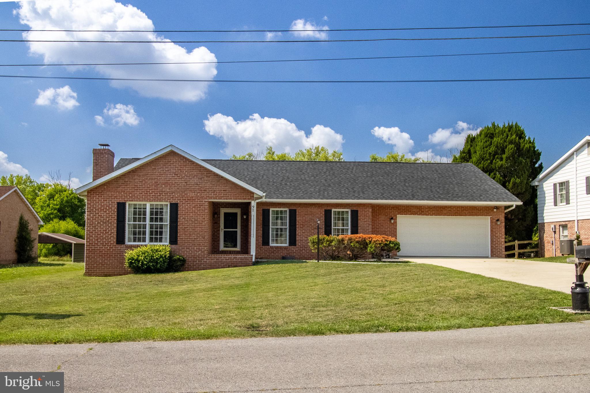 If you are looking for a brick rancher in town but with an out of town feel then this one is for you.  So close to everything  for convenience but in an established development.  New roof just a month old.  3 bedrooms and two full bathrooms in just a little over 1,700 sq ft with mostly hardwood floors throughout.  Large primary bedroom with double closets and private bath.  Hall bath to accommodate the additional bedrooms.  Large garage with storage and an additional workshop.  Nice level yard that leads to your own private creek access.  Frequently seen ducks, deer, fox and an occasion crane fishing in the creek.  This home has the best of both worlds.  Intown town convenience and nature in your backyard.  You can even walk to the lighted pickle ball courts.