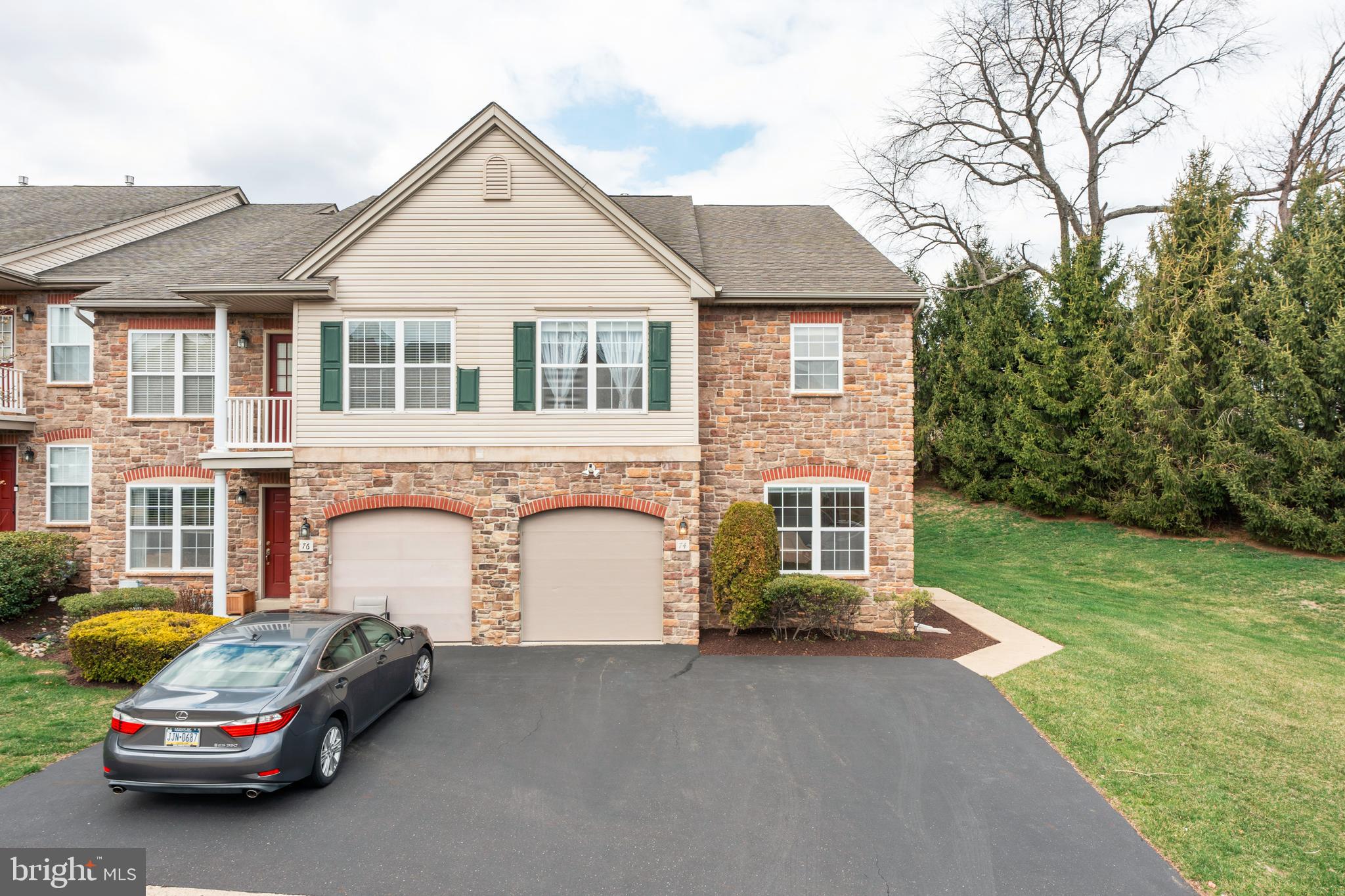 Welcome to 74 Ashley Drive, a stunning end-unit townhome in the highly sought-after Walnut Ridge community of Lower Southampton. Boasting one of the best locations in the neighborhood, this home offers expansive outdoor space and unmatched privacy.

Step inside to be greeted by soaring ceilings, an open-concept layout, and oversized windows that flood the space with natural light, creating a seamless connection between the indoors and outdoors. The remodeled and expanded eat-in kitchen is the heart of the home, featuring an oversized center island, sleek stainless steel appliances, and a commercial-grade range hood—a dream for any cooking enthusiast. Whether preparing daily meals, hosting casual get-togethers, or celebrating the holidays, this kitchen is designed to bring everyone together.

Throughout the main level, gleaming hardwood floors create a bright, modern ambiance reminiscent of new construction. This level also includes a convenient powder room and direct access to the one-car garage, plus a driveway with parking for two.

Downstairs, the spacious finished basement with recessed lighting and natural light from a full-sized window is perfect for a home office, guest suite, or entertainment space.

Upstairs, the primary suite impresses with vaulted ceilings, a walk-in closet, and a spa-like en suite bathroom featuring a double vanity, soaking tub, and walk-in shower. Two additional generously sized bedrooms offer great closet space, complemented by a spacious hall bathroom. The laundry area on this level adds everyday convenience.

Additional highlights include all appliances under three years old, a newer water heater, and a prime location in the award-winning Neshaminy School District. Enjoy easy access to public transportation, major highways, and Center City Philadelphia, making commuting a breeze.