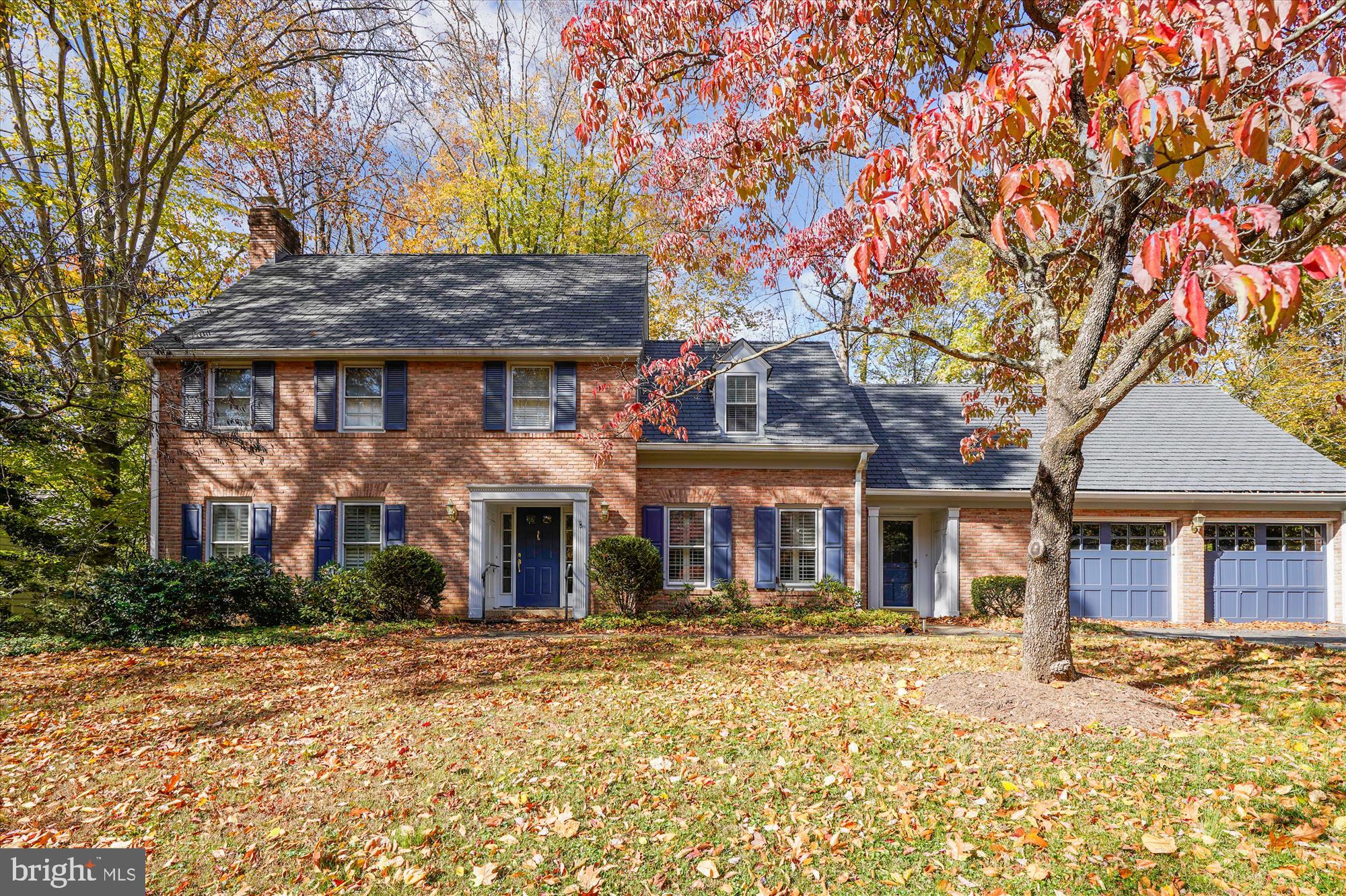 Welcome to this elegant Rixey-built colonial in the prestigious Bradley Hills Grove neighborhood. Known for solid, all-brick construction, Rixey designed this home to stand out on the street while offering a grassy backyard that backs to trees. . The entry foyer features two coat closets and a charming staircase leading upstairs. The formal living room has windows on both ends and a wood-burning fireplace. Across the foyer is the formal dining room, conveniently next to the updated kitchen. The kitchen includes custom cherry cabinets, granite countertops, a second wet sink, and a bright breakfast room overlooking the terrace. The mudroom and laundry area connect the kitchen to the garage and include built-in pantry cabinets, another coat closet, access to the oversized two-car garage, and a door to the front walkway. Next to the kitchen is a cozy family room with a built-in wet bar nook, floor-to-ceiling built-ins, and another wood-burning fireplace. A powder room is nearby. The screened-in porch with a skylight invites you to enjoy outdoor dining and leads to a private stone terrace with a pergola. Upstairs, there are four large bedrooms, two fully updated bathrooms, and one bedroom with built-ins that can double as a flex space or office. The owner's suite includes a separate office or sitting/dressing area, plenty of closets, and walk-in storage in the eaves. The lower level has luxury plank flooring, recessed lighting, a guest or exercise area, a full bath, and daylight walk-up steps to the backyard. A third fireplace anchors the rec room, perfect for game or movie nights. The home has been freshly painted throughout, with new lower-level flooring, updated lighting, and refinished hardwood floors, so you can move right in. A durable composite slate roof tops the house, and the HVAC system was replaced in 2024. The location offers easy access to 495, 270, Clara Barton Parkway, and the GW Parkway. It's close to many golf courses and clubs, and just a short drive to downtown Bethesda shops, dining, and Montgomery Mall. The home is in the Whitman/Pyle school cluster. This truly is a forever home!