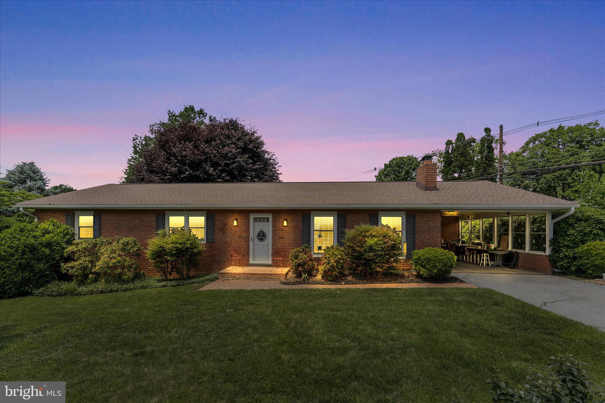 Sprawling, lovingly cared for, all brick rancher in Oak Ridge Development. NO HOA.  GREAT COMMUTER LOCATION. ESTABLISHED NEIGHBORHOOD, CLOSE TO ALL CONVENIENCES. Everything you need on one level. Roof and air handler are less than 10 years old. Enjoy the benefits of Simonton replacement windows,  a 2025 Proterra heat pump hot water heater., replacement liner in upstairs chimney flue, and new electric meter that keeps track of off-peak usage hours for extra savings. The primary ensuite comes with a beautiful custom shower.  3 additional bedrooms and a hall bath provide ample space for a crowd. The eat-in kitchen features cherry cabinets and stainless steel appliances. Spacious living room and dining rooms with hardwood floors are the perfect blend for entertaining or relaxation. The laundry room is on the main level and boasts built-in cabinets. Enjoy the peaceful setting with a cup of java and a good book from the comfort of your screened in porch. At the lower level there is even more room to spread out. A large finished room is currently set up as a game room. It could also be an additional bedroom. A workshop with fireplace is ready for all your projects. Mature landscaping and cedar privacy fence complete this oasis.