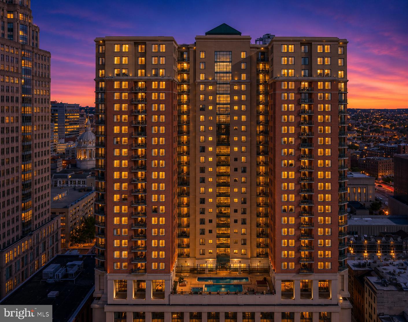Experience elevated city living in this beautifully maintained 1-bedroom, 1-bath condominium in the sought-after 414 Water Street. Located on the 13th floor, this light-filled residence offers an open-concept layout with hardwood floors, a cozy gas fireplace, and a private balcony showcasing stunning city views. The kitchen features granite countertops, stainless steel appliances, and a breakfast bar, creating the perfect space for everyday living and entertaining.

The spacious bedroom offers direct access to the full bath, while the convenience of an in-unit washer and dryer makes daily living effortless. This unit also includes a deeded garage parking space and a large private storage unit conveniently located just across the hall.

Residents enjoy exceptional amenities including 24-hour concierge service, secure building access, a fitness center, outdoor pool, business center, club room, and meeting spaces. Ideally situated just steps from the Inner Harbor, Harbor East, restaurants, shopping, entertainment, and major commuter routes, this home offers the best of Baltimore's vibrant downtown lifestyle with comfort, convenience, and luxury all in one.