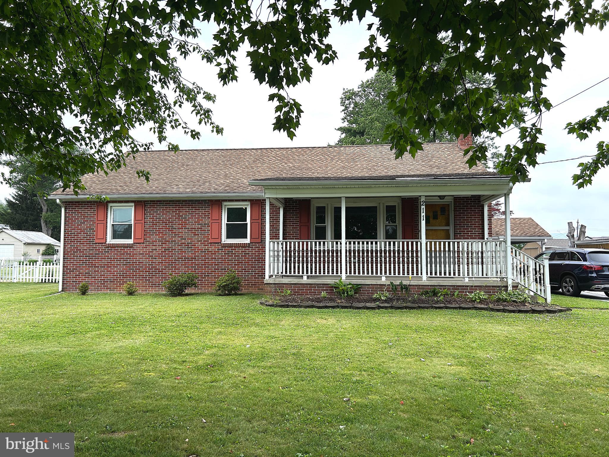 Charming in-town home ideally located adjacent to the Fairfield Area School and a large open green space! This well-maintained property offers plenty of living space, featuring a spacious family room, comfortable living room, and a huge eat-in kitchen perfect for gatherings and everyday living. Enjoy relaxing mornings on the inviting 7x21 covered front porch or unwind in the 12x19 enclosed rear porch overlooking the fully fenced backyard. The home includes 3 generously sized bedrooms, and 1 1/2 bath. Additional highlights include a full basement with laundry area, abundant storage, and a large shed for all your tools, hobbies, and outdoor equipment. Convenient in-town location with room to spread out both inside and out. This is a must-see home!