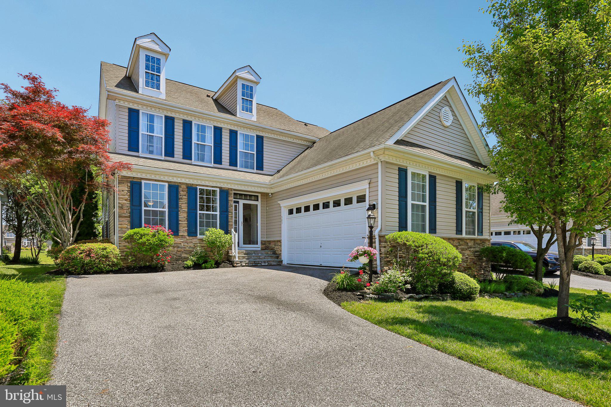 MAJOR PRICE IMPROVEMENT - $24,000  NOW $665,000

BULLE ROCK Where Life Imitates Vacation!

303 Master Derby Drive is more than a home; it is a private waterfront retreat nestled within the prestigious gated community of Bulle Rock, Harford County’s most sought-after luxury destination. Perfectly positioned on a premium lot backing directly to the tranquil pond, this exceptional residence offers approximately 5,000 square feet of beautifully finished living space, combining elegance, comfort, and resort-style living with breathtaking water views throughout.

From the moment you enter the dramatic two-story foyer, you are greeted by abundant natural light, soaring ceilings, rich hardwood flooring, and an open, flowing floor plan designed for both grand entertaining and everyday luxury. The formal living and dining areas seamlessly transition into the expansive family room featuring a cozy gas fireplace, transom windows, and stunning panoramic views of the pond.

The gourmet kitchen is the heart of the home, thoughtfully designed with an oversized counter bar, pantry, breakfast nook/sunroom, and upgraded stainless steel appliances, including a French door refrigerator, gas cooktop, double convection wall ovens, dishwasher, and new microwave. Just beyond, glass doors open to a spacious deck overlooking the water ... the perfect setting for morning coffee, evening wine, or unforgettable outdoor entertaining.

One of the home’s most remarkable features is the luxurious main-level primary suite, offering true main-floor living with a private sitting area/sunroom overlooking the pond, creating a peaceful sanctuary unlike anything else in the community. The suite is complemented by a spacious bath and generous closet space. Upstairs, a second primary suite offers exceptional flexibility for multigenerational living or extended guest accommodations, along with two additional bedrooms, two full baths, and a versatile loft ideal for an office, reading nook, or lounge.

The fully finished lower level is truly an entertainer’s dream. Designed with versatility and comfort in mind, it features a media room/man cave, expansive recreation areas, game table space, a large bar and kitchenette complete with sink, mini refrigerator, and two-burner electric cooktop, plus a fifth bedroom and full bath — ideal for guests or an au pair suite. Additional highlights include a private office with French doors, built-in bookshelves and recessed lighting, a dedicated craft room, and extensive storage space.

Step outside and experience the beauty of the meticulously manicured grounds enhanced by extensive hardscaping, a charming koi pond with a fountain, and a unique greenhouse-covered entrance to the lower-level stairs. Every detail of the exterior has been carefully curated to create a private outdoor oasis that blends beautifully with the surrounding water views.

Located within the exclusive gated community of Bulle Rock, with 24-hour security and world-class amenities, residents enjoy a lifestyle second to none, including golf, pools, clubhouse amenities, fitness facilities, walking trails, and more.

Rarely does a home offer this combination of luxury, flexibility, waterfront serenity, and prestigious community living. 303 Master Derby Drive is a truly extraordinary opportunity to own one of Bulle Rock’s finest pond-front properties.