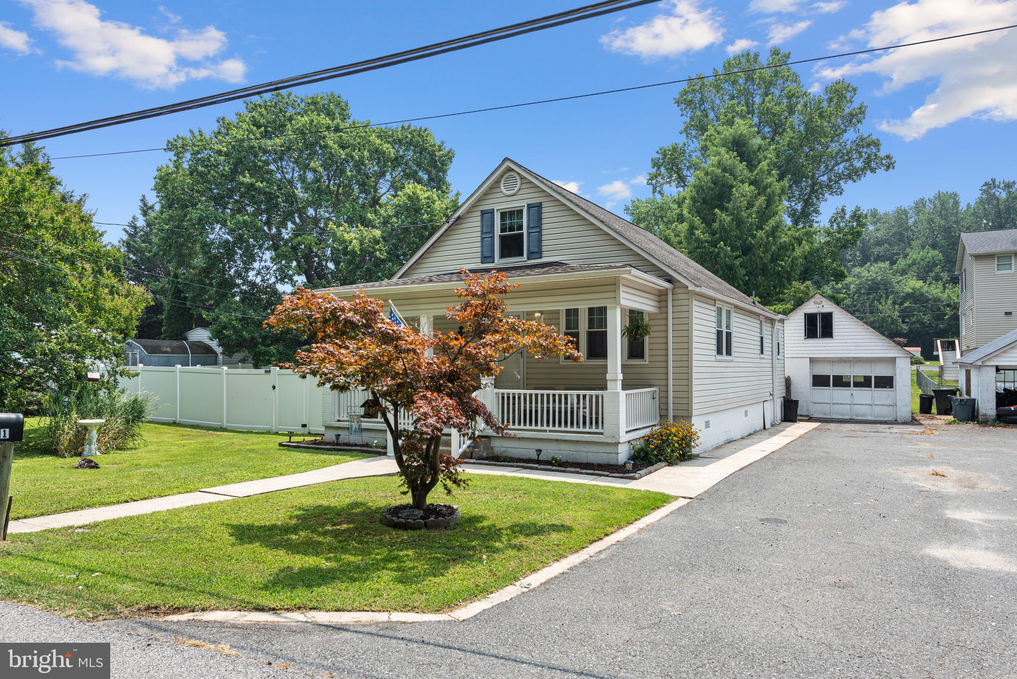 Bigger than it looks! Detached home at a townhouse price in Sparrows Point. In the last 8 years: new boiler, new HVAC, added half bath, new kitchen, windows & doors (3 years old). Additional features include recent plumbing updates, hardwood floors, all appliances, and a large detached garage. Sitting on a double lot, offering space potentially suitable for a pool, cabana, or an accessory dwelling unit (ADU)—a true blank canvas for creating your backyard oasis. Located near Fort Howard, North Point State Park, and multiple marinas/boatyards. Competitively priced to sell.