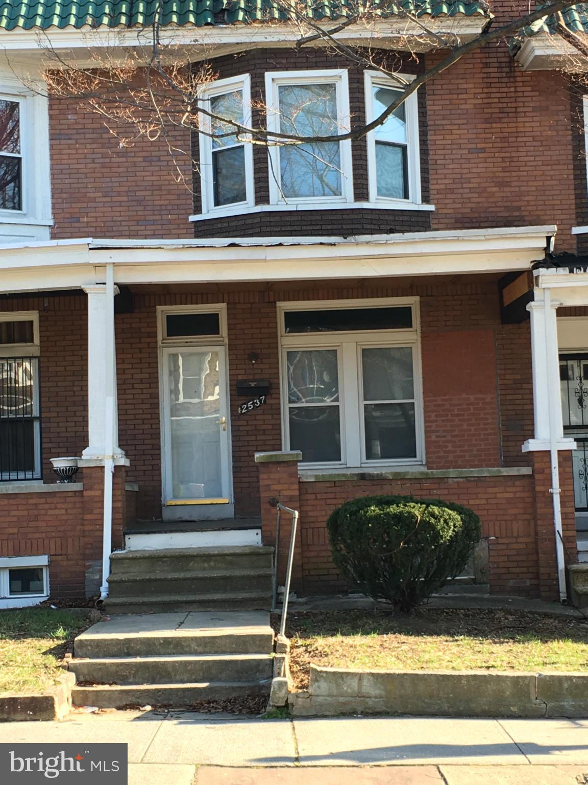 PRICE IMPROVEMENT - Great starter home on quiet block with long term homeowners.  Three minutes to the MARC, ten minutes to the Inner Harbor and to I-95 and 295.  Some rooms are already primed awaiting your personal touch.  Also makes a great investment property.  Enjoy the nice rooftop deck over the garage in the back or the inviting front porch to sit and enjoy a breeze.  SOLD AS IS.