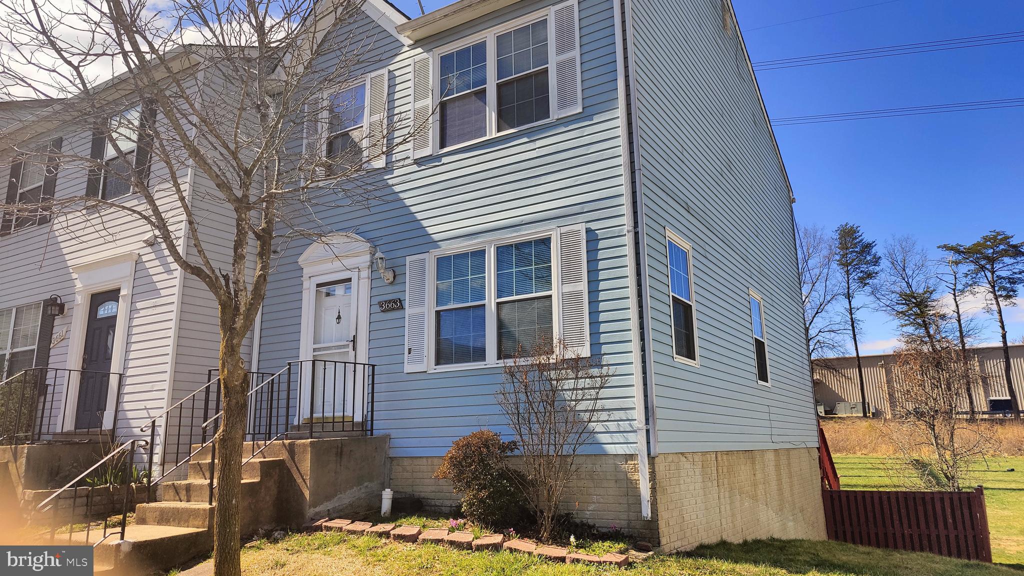 This is an end-unit TH with three levels and a walkout basement. The deck off the LR overlooks trees. The large fenced backyard is close to everything: I-95, Rt 234, Quantico, Belovir, Pot Mills Mall, Pr Wm City Parkway, a grocery store, and shops. You can walk to it.