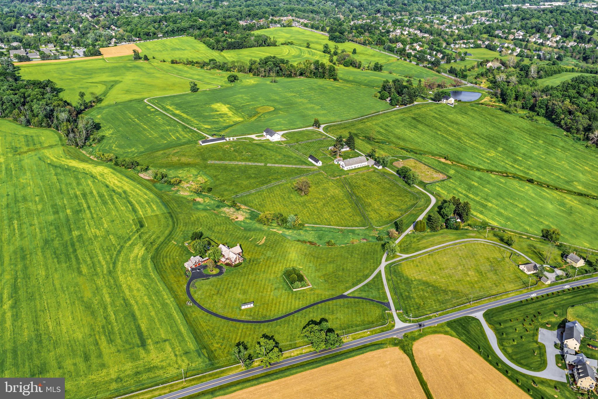 Seize the once in a lifetime opportunity to own, utilize, customize and preserve part of historic Crebilly Farm. This 27.40 acre multi -barn parcel, placed under conservancy, features enclosed paddocks, several notable barns including a classic Pennsylvania forebay barn, large horse barn with 16 stalls, tack room, feed room, wash stall ,  corn cribs, storage sheds, 2 guest houses and an original blacksmith shop. The new owner of this parcel may build the home of their dreams on this stunning site with breathtaking views and may add additional structures such as a swimming pool, tennis court, indoor horse area and more. This lot also has access to the adjacent 206 acres Natural Lands Trust grounds owned by Westtown Township and under conservancy, intended for passive use walking trails.  Create the compound of your dreams and seize this rare opportunity to own a spectacular oasis in a coveted and convenient location.  Just minutes from renowned schools, shopping, restaurants, transportation, Philadelphia International Airport and more.