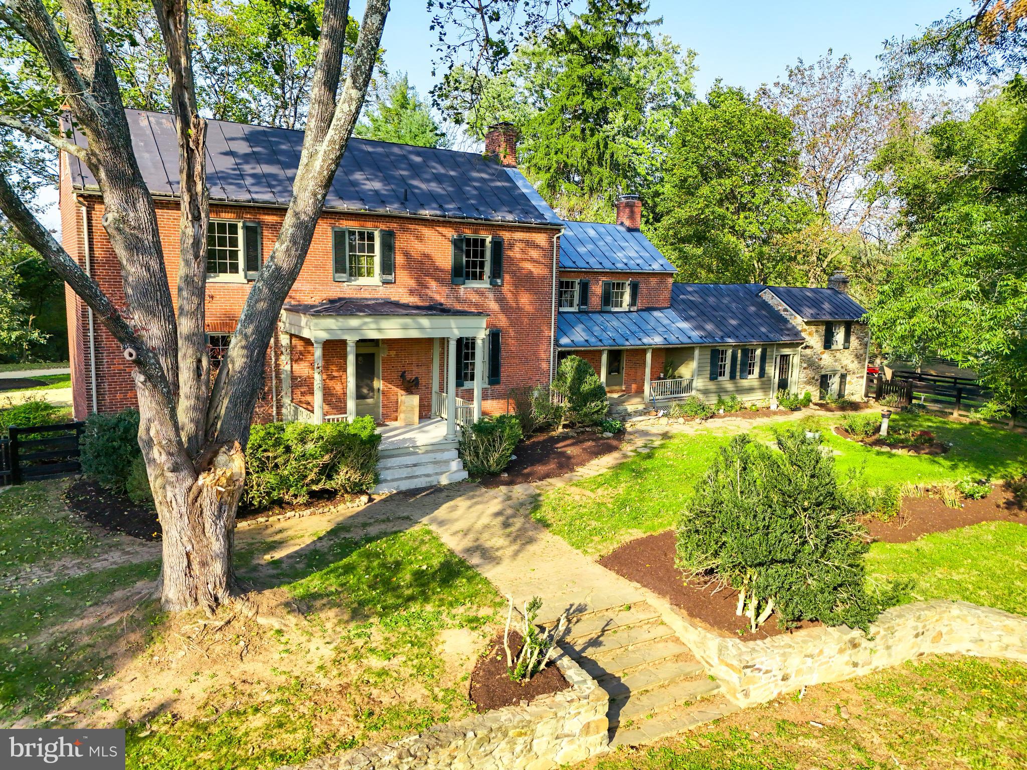 Montevideo — a magnificent circa 1771 estate with brick residence set on protected countryside in beautiful Loudoun County, north of Middleburg. Exceptionally preserved and thoughtfully updated, the home greets you with a classic center hall and gracious main-level rooms that blend historic charm with modern comfort.

Upstairs offers three bedrooms and two full baths. The eat-in kitchen with marble counters and free standing island serves as a warm, functional heart of the house. A lovely stone wing, complete with an adjacent full bath and laundry, provides an ideal private guest suite or studio.

Equestrian and farm amenities include expanded, well-designed barns with multiple stalls, several paddocks and larger turnout fields, plus a separate farm entrance drive for convenient access and privacy.

Protected by a conservation easement, Montevideo presents a rare opportunity to own a piece of history within a stunning rural setting—perfect for buyers seeking heritage, equestrian facilities, and enduring landscape preservation.