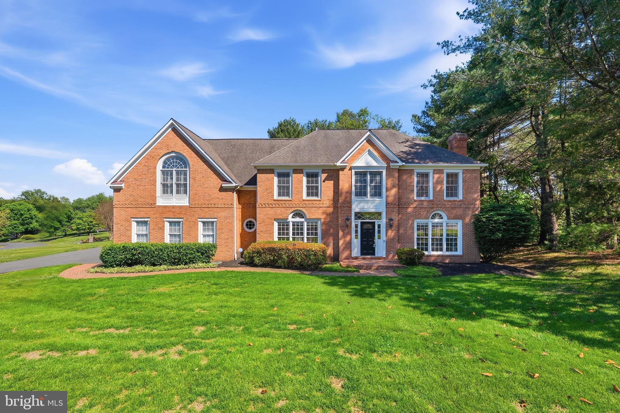 Welcome to a this renovated masterpiece in the Langley School pyramid.  This 5 bedroom, 5 full bath colonial offers a 3 car side load garage on a flat .83 acre  corner lot in a premier location.  Enter into the soaring, light filled foyer.  There are hardwood floors on the first and second level.  So many updates and special features  A main floor bedroom/office, plus living room, dining room, gourmet kitchen with high end appliances including a six burner professional gas stove.  A full bath, and a 2 story great room overlooking the flat back yard.  Fill the home with music through the integrated speaker system. The upper level features a luxurious primary suite with 4 walk in closets, updated spa bath, and vaulted ceiling.  The 3 additional bedrooms include 2 more full baths, and a very special loft bedroom.  The lower level features a theatre room, game area, and another full bath, great room, and tons of storage.  Don't miss this special opportunity!  Roof is 2019, kitchen and primary bath remodel in 2020-2026.