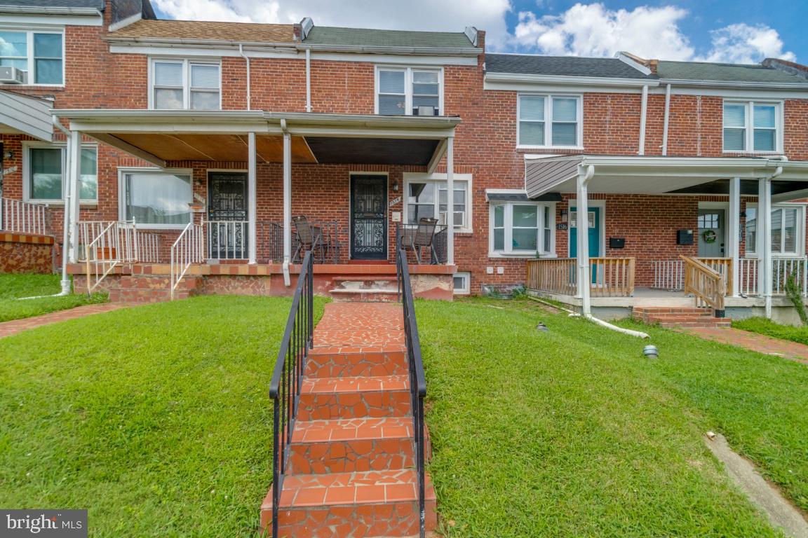 Welcome to 1514 N. Kenwood Avenue—a beautifully maintained 3‑bed, 1½‑bath brick townhome nestled in East Baltimore. Bright and welcoming, this home features spacious living and dining rooms, a well-appointed galley‑style kitchen with stainless steel appliances, and a finished basement with newer flooring and a dedicated laundry area—perfect for modern convenience. Natural light streams in through a skylight and large windows, illuminating the updated hardwood and laminate floors. Outside, enjoy a private fenced backyard—ideal for relaxing or entertaining. Located just blocks from CityLink Gold and Pink bus routes, you're connected to major city hubs, Penn Station, and regional transport, while easy access to Charles Street, I‑95, and the Baltimore–Washington Parkway puts commuting within reach. Schedule a showing today and make 1514 N. Kenwood Avenue your new home!
