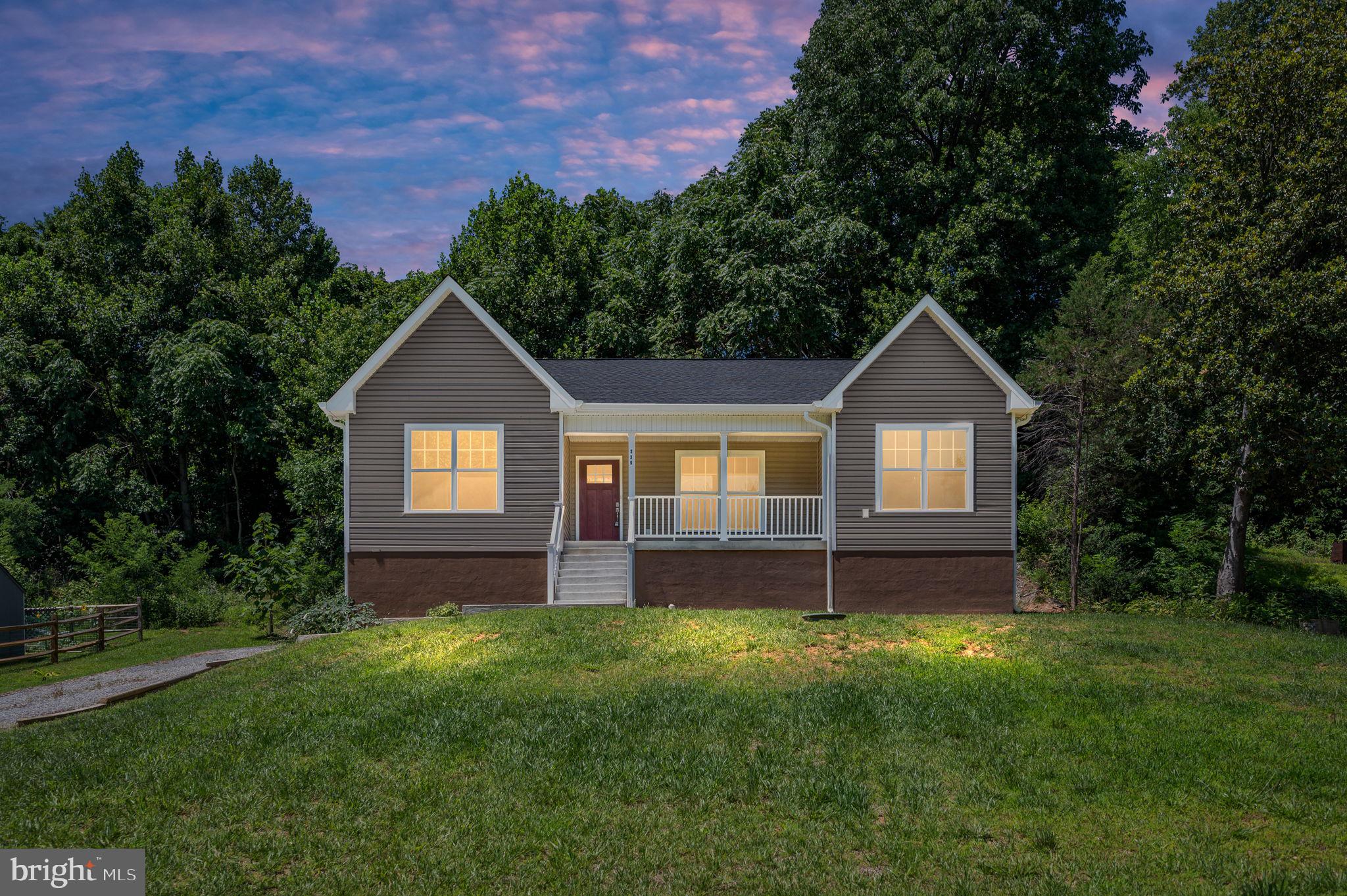 WELCOME HOME! SITUATED IN A QUIET RIVERFRONT COMMUNITY, THIS BRAND NEW  CONSTRUCTION HOME IS  MOVE IN READY AND AWAITING ITS NEW OWNERS.  JUST IN THE KNICK OF TIME FOR ALL OF YOUR FUN SUMMER ACTIVITIES! ENJOY BEING JUST MINUTES FROM THE POTOMAC RIVER, AND A SHORT DRIVE TO COLONIAL BEACH, FERRY LANDING PIER, AND MORE! THROUGHOUT THE PROPERTY YOU WILL NOTICE  ALL OF THE MODERN UPDATES YOU HAVE BEEN LOOKING FOR: WHOLE HOUSE LUXURY VINYL PLANK FLOORING, BEAUTIFUL WHITE CABINETS WITH CROWN MOLDING, UPGRADED STAINLESS STEEL APPLIANCES, GRANITE COUNTERS, FARM STYLE SINK, RECESSED LIGHTING, UPGRADED BATHROOMS WITH LUXURY TILE, GRANITE SINK COUNTERS, TASTEFUL HARDWARE, AND LARGE PRIMARY BEDROOM WITH ITS OWN WALK IN CLOSET! ESCAPE THROUGH YOUR SLIDING GLASS DOORS TO A PRIVATE BACK DECK BACKING TO TREES, OR ENJOY MORNING COFFEE ON YOUR LARGE FRONT PORCH. THE OPPORTUNITIES ARE ENDLESS AT 336 AMERICAN DRIVE! CALL TODAY TO SCHEDULE YOUR OWN PRIVATE SHOWING, YOU DON'T WANT TO MISS OUT ON THIS ONE THIS SUMMER!!