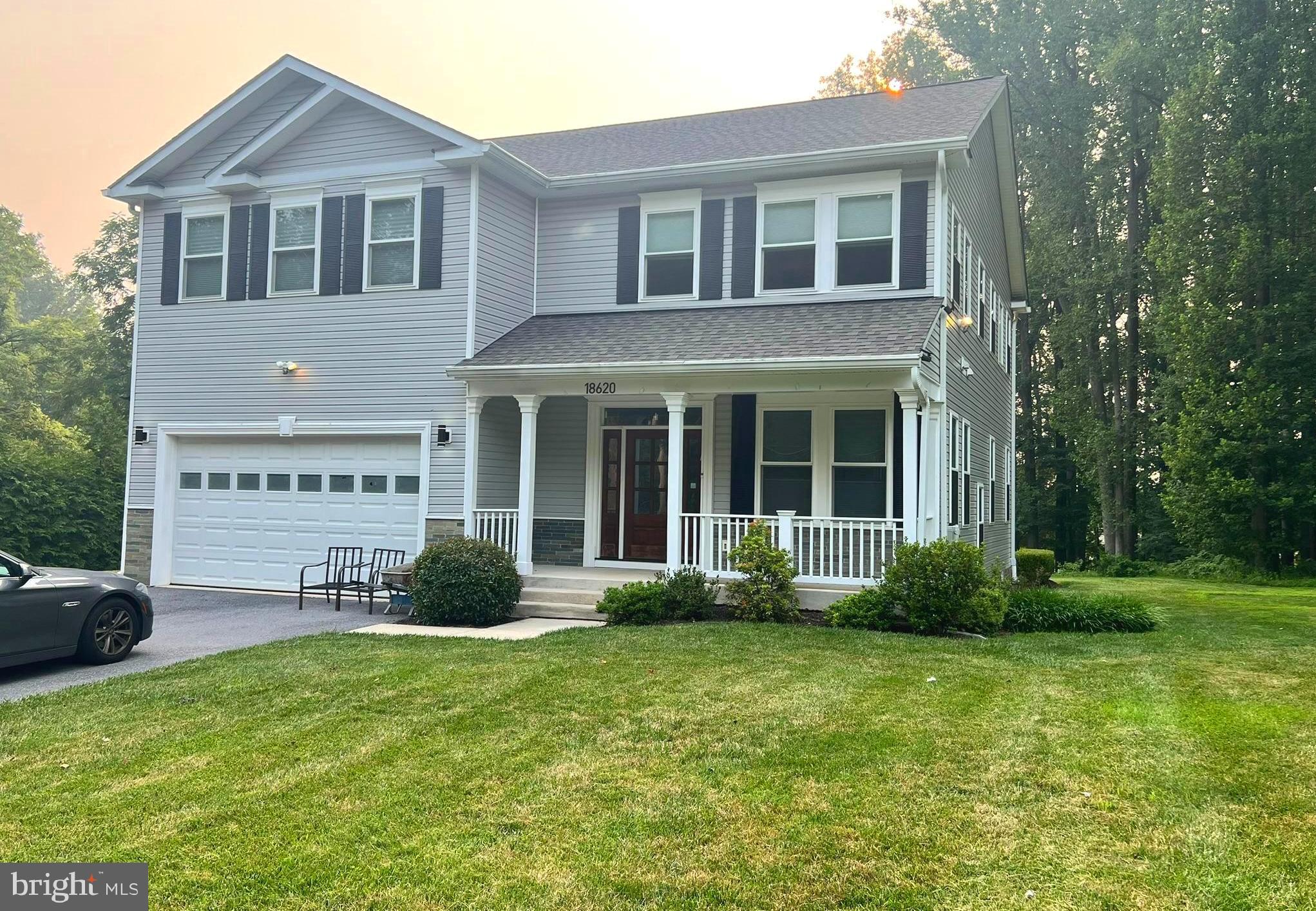 Welcome to 18620 Jerusalem Church Road, an upscale home on a private lot in sought after Poolesville! Situated on over an acre of land, this  Poolesville home welcomes you with soaring 10' ceilings, gleaming hardwood floors in main level, gorgeous moldings and tasteful wainscoting. Three fully finished levels.
You enter through the gracious front porch accented with wood working and stonework. Once inside, you'll appreciate the picture-perfect living and entertaining open concept spaces that set this luxurious 4,000+ square foot home apart! This home offers you lots of natural light. You'll notice the high efficiency two-zone HVAC system. The well-appointed gourmet kitchen, with its rich cabinetry, granite counter tops and high end appliances, ideal for cooking and entertaining with comfort and ease. The upstairs offers you your own private sanctuary in the luxurious main suite with it's separate full bathroom. Four additional and generously large bedrooms and two full bathrooms. Laundry room complete the upper level. All five bedrooms are accessed through an expansive landing area with gleaming hardwood floors. The fully finished walk-up basement incorporates a large recreation room, a full bath and plenty of room for storage. Walk outside to the private rear yard and enjoy the peaceful sounds of nature.  Enjoy the comforts of small town living within easy commuting distance to Rockville, Germantown, Gaithersburg, and Frederick .
Thanks for showing.