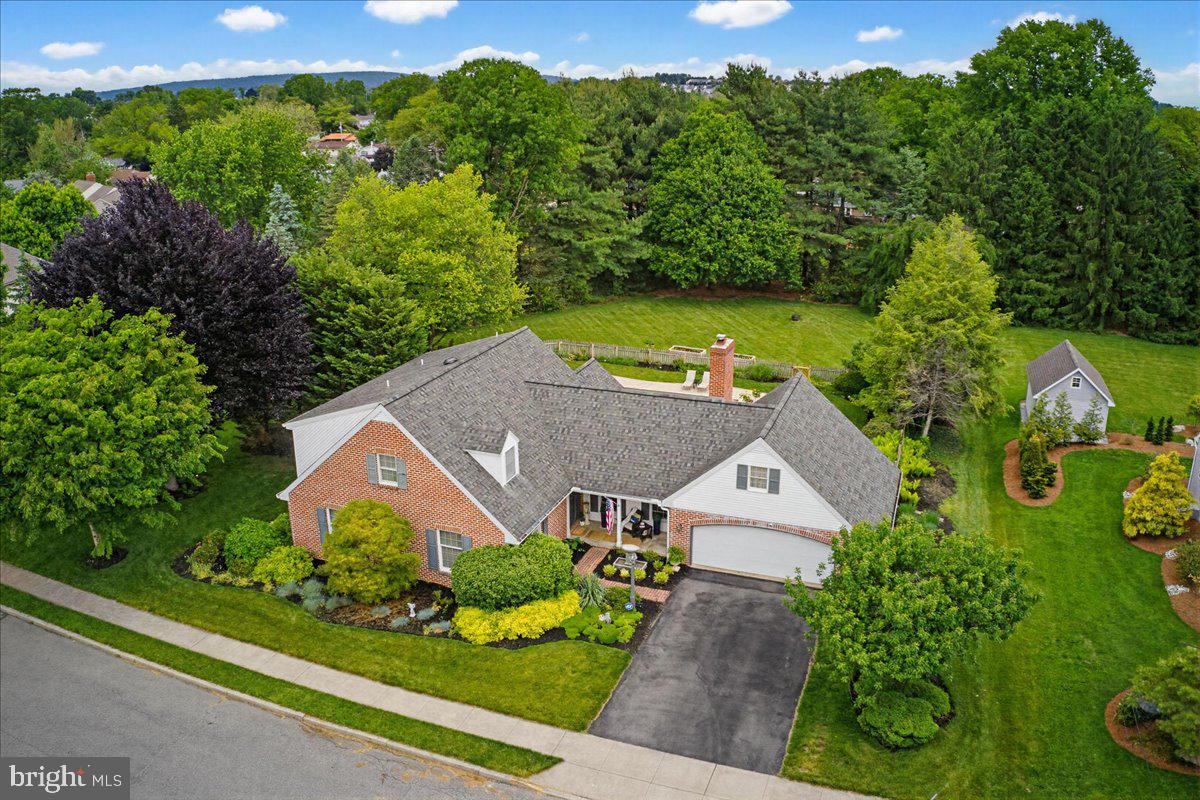 Rare opportunity to own a spacious brick home on 1.11-acres in the heart of Manheim. The backyard is a true oasis that includes a 20’ x 40’ inground pool, covered patio, hot tub jacuzzi, privacy from neighbors and a massive flat yard perfect for gardening, entertaining, recreation, etc. Inside the property, you’ll find nearly 3800 sq. ft. of finished space featuring a beautiful owner’s suite, 1st floor bedroom, woodburning fireplace in the family room, a finished basement with bar and pool table, and a 28’ x 25’ oversized garage. Additionally, the 2 upstairs bathrooms were just remodeled (in 2025-2026). This home is tucked away in a private and peaceful neighborhood yet within walking distance to Market Square with dining, shopping and entertainment (AND walking distance to the elementary, middle, and high school). This property is one of a kind. Reach out to us for a showing!