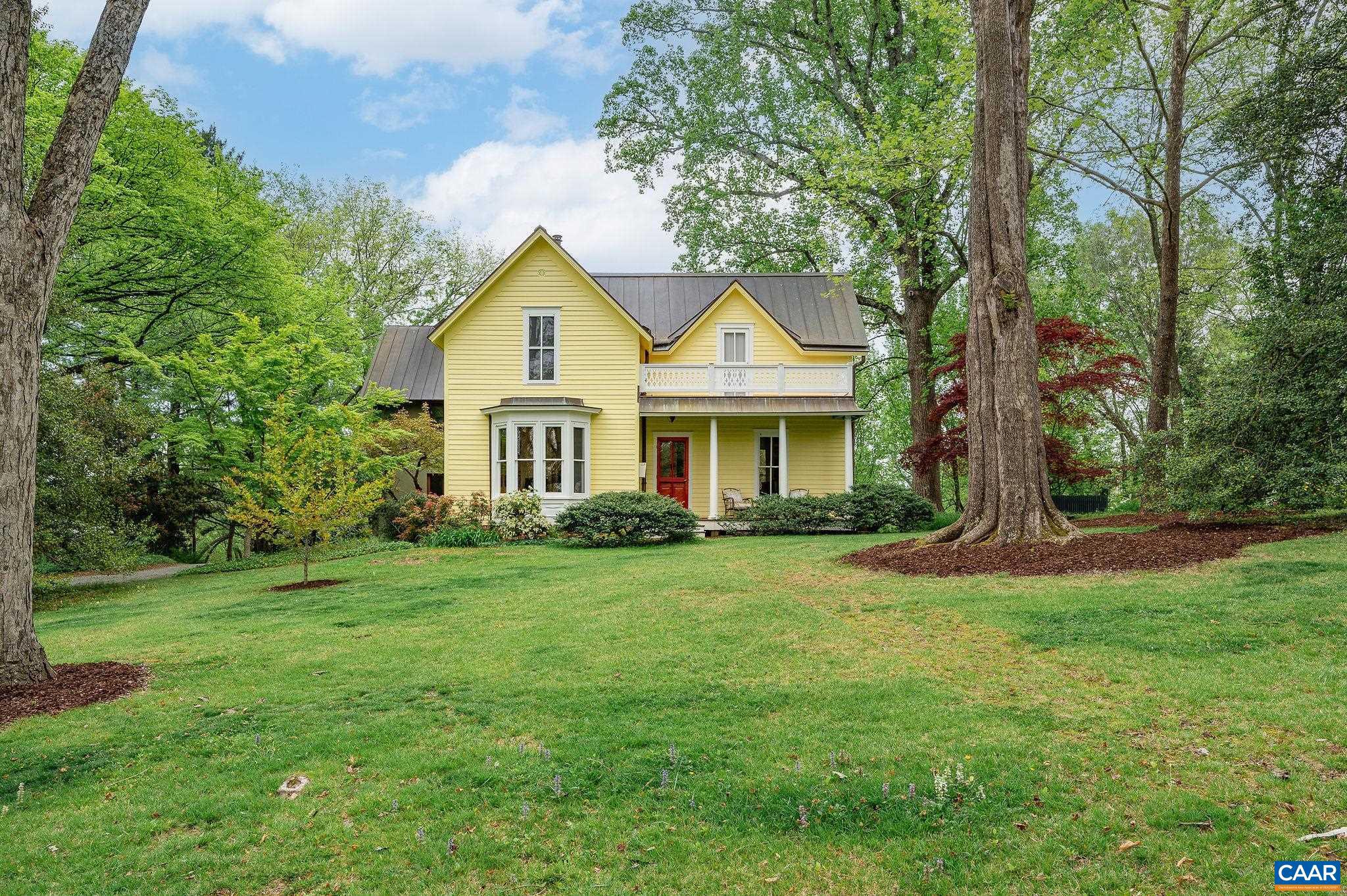 Historic house meets architectural masterpiece in this unique offering. The owner/architects have taken one of the original stately Cville homes from 1870 & brought the outdoors into the house. Keeping the charm at the front with original moldings & windows, the 2 story addition flows seamlessly to the backyard. This newer build has floor to ceiling Spanish cedar windows with stunning views of the 1.1 acre manicured lawn. This park-like setting is lush with mature plantings & historic Oaks & Tulip Poplars. The heart of the house has accordion doors that open completely to a Sapele deck overlooking the 6.5 acres of green space at Davis Park. Seasonal mountain views in North Downtown CVille. Baths include Italian glass tile, Waterworks soaking tub & Dornbracht faucets.  The Kitchen includes custom cabinetry, separate bar and large pantry.  Soapstone counters, Subzero refrigerator. Private concrete pool with Bluestone terrace. 1 car garage.,Soapstone Counter