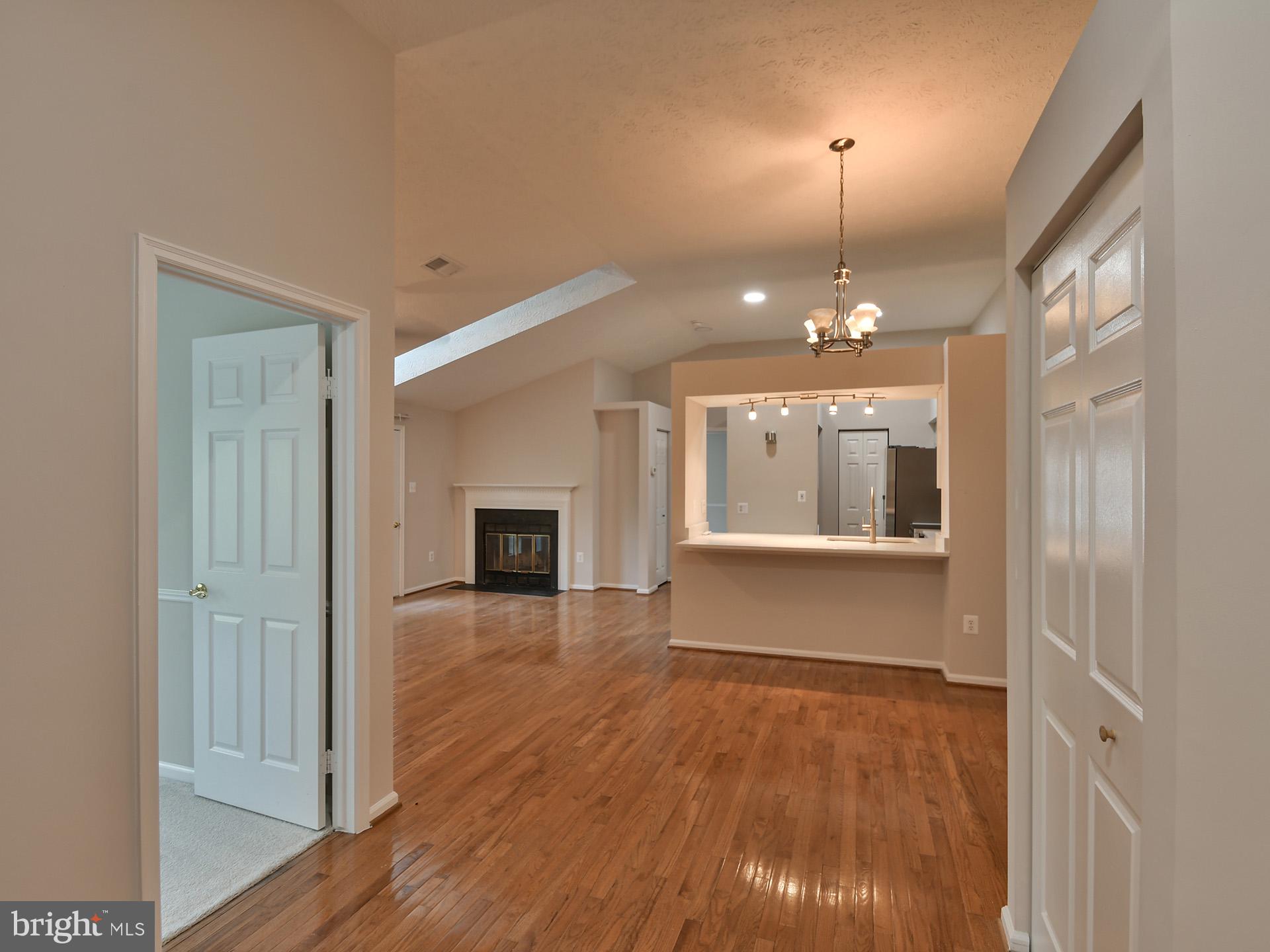 Remodeled unit with vaulted ceilings. Upgrades include new kitchen cabinets, stainless steel appliances and new stone counter-tops. Remodeled bathrooms, new carpet in bedrooms and upgraded recess lights.