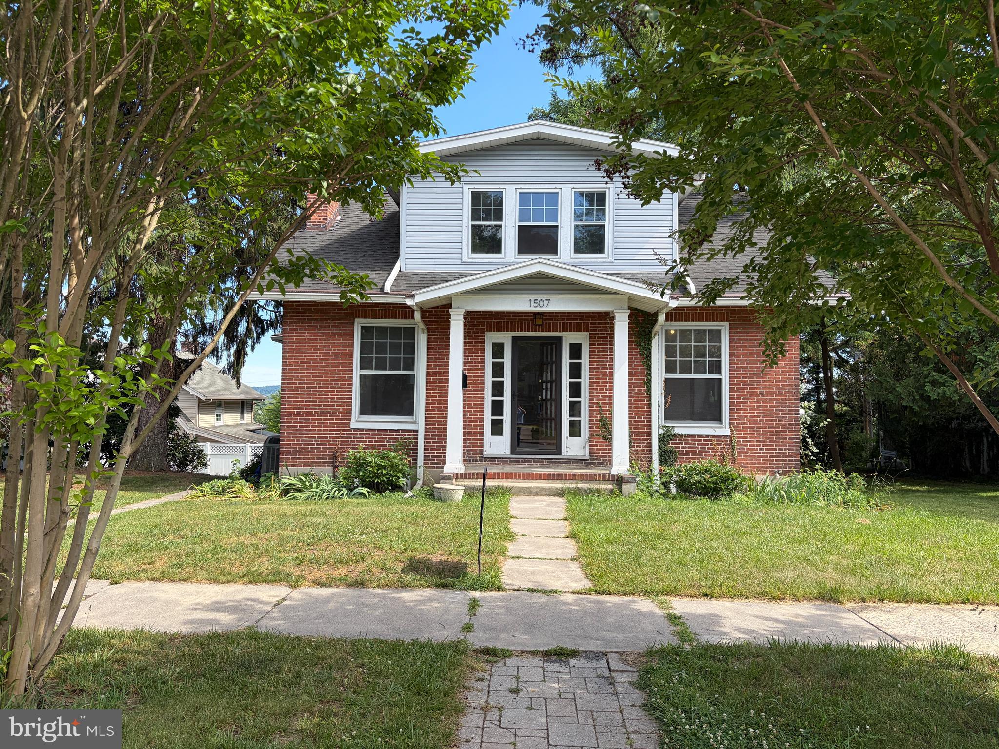 A rare hilltop gem in the heart of Camp Hill Borough. This beautifully updated 1910 Craftsman home blends historic character with modern upgrades. Features include rich hardwood floors, chestnut millwork, custom bathrooms, and a chef’s kitchen with a 5-burner gas range, pot-filler, and warming drawer. Soaring 9’ ceilings, original cypress wavy-glass windows, and a stunning stained glass window add timeless charm. Central AC, walkout basement, mature trees, and perennial gardens round out this one-of-a-kind property. Enjoy morning coffee on the summer porch with sweeping views. Just one block north of Market Street means easy access to shops, restaurants and the Fredricksen Library. The Susquehanna River, City Island and Harrisburg are a quick car ride from this highly desirable West Shore location. Being close to 581, 81, 83, 11 and 15 provides convenient regional access in all directions.