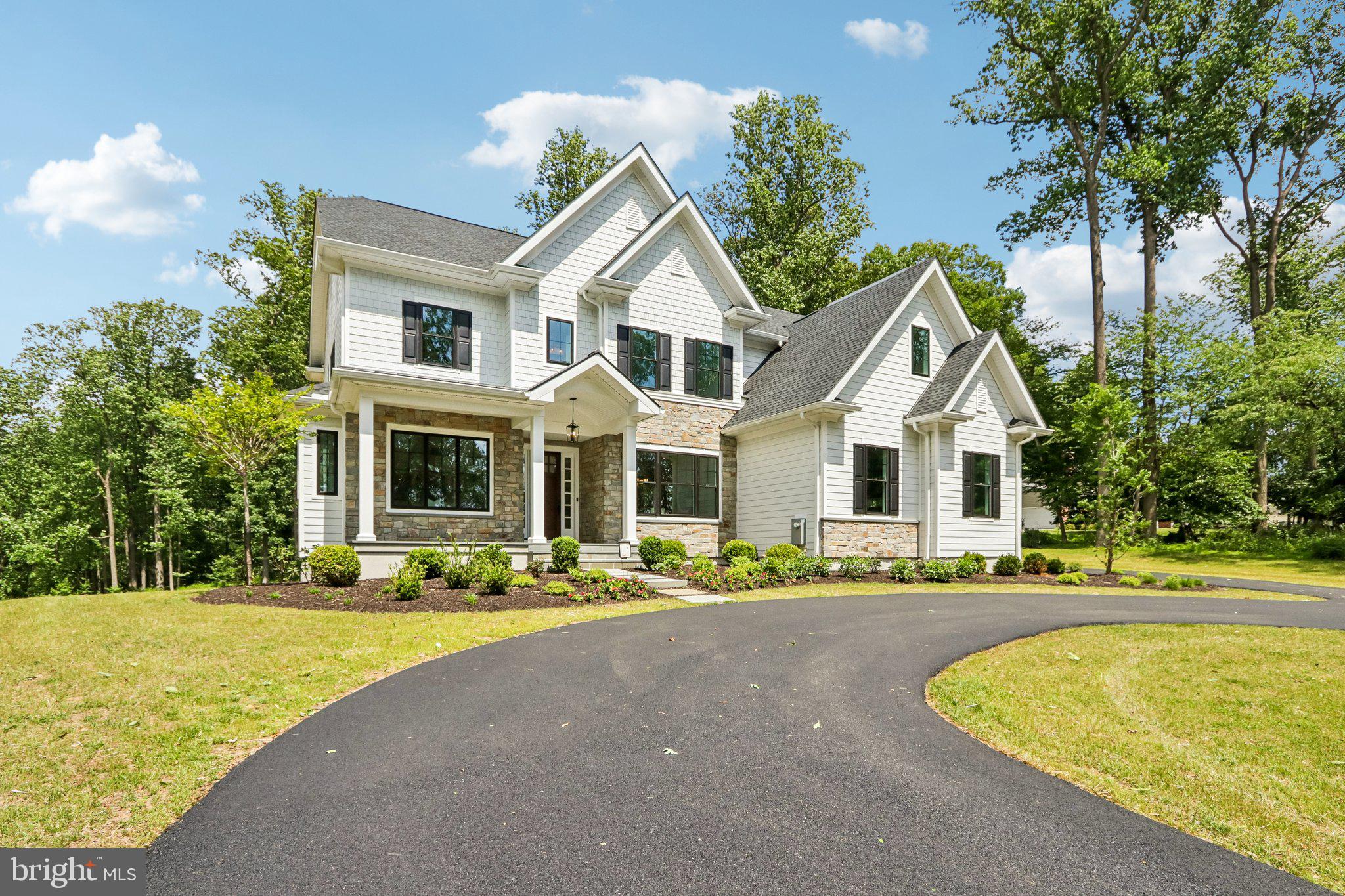 Stunning Bentley Builders new construction property on a picturesque 2+ acre lot in the heart of Malvern and Great Value school district! This Atlee model home features just over 5200 sqft of finished living space, 4 bedrooms (all with walk-in closets and built-in systems) 3 full bathrooms, one powder room, and a three car attached garage. The first floor offers beautiful wide plank hard wood floors; 10ft ceilings; designer lighting throughout; a formal study with glass doors for privacy; a spacious dining room with adjoining butler’s pantry with cabinet storage and wine fridge; and a gourmet kitchen with custom cabinetry, island seating, commercial grade appliances, and an attached breakfast room. The family room with beamed ceiling, built-in bench wall, and gas fireplace flows effortlessly from the kitchen and offers sliders to the covered rear porch - perfect for al fresco dining and entertaining. This level is completed with a mudroom with built-in cubbies and a large closet for storage and a powder room. The second level boasts a luxurious primary suite with dual walk-in closets, tray ceiling, and an ensuite bathroom with soaking tub, dual vanities, and spa-inspired shower; another ensuite bedroom with private bathroom; two additional bedrooms with a shared bathroom; and a convenient laundry room. The bright lower level offers additional living space, tons of storage and is plumbed for a future bathroom. The flat, rear yard is perfect for a future pool, swing set, or any other outdoor activity you prefer. Ideally located, this home is just minutes from the PA Turnpike, Route 202, and the shopping and dining options of King of Prussia, downtown Malvern, and the Main Line, and provides easy access to some of the area’s most prestigious private academies. Call today for more information, this property is not to be missed!