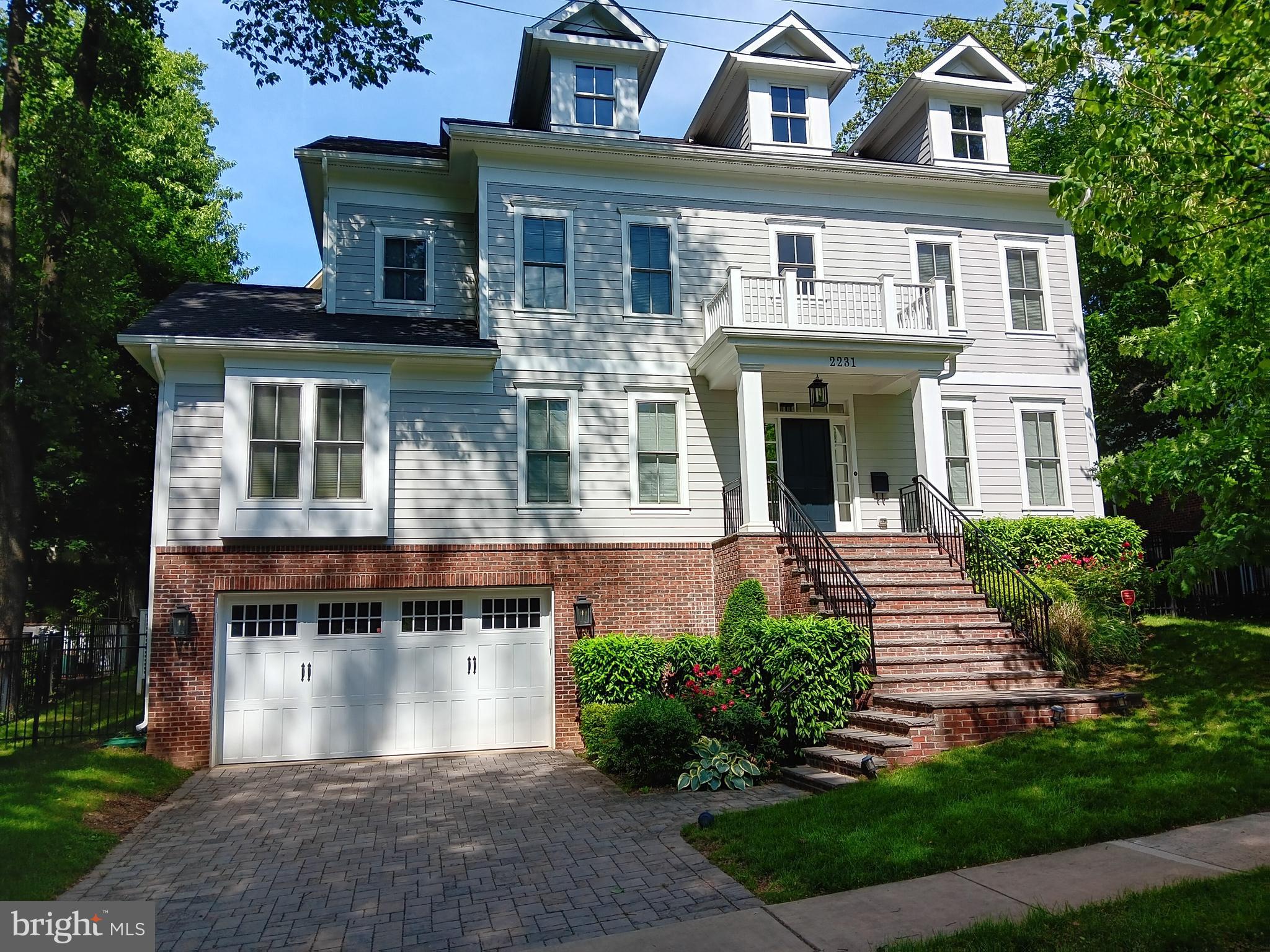 Modern, stylish 6 years young Craftsman home in sought-after Lee Heights/Donaldson Run. Designed and built by noted local builder Spring Street Development. 6 bedrooms, 5 1/2 baths including a hard to find main level BR/BA suite with 2 closets. High quality finishes throughout, including well-maintained hardwood floors and lovely crown molding. Open concept kitchen features center island, 6-burner cooktop, double oven, quartz countertops, ample cabinetry, beverage fridge and walk-in pantry (phew!). Desired open flow from kitchen into large, light-filled family room with a gorgeous tray ceiling and fireplace. Good-sized and well-configured formal living and dining rooms. Spacious primary suite boasts walk-in closet, oversized shower, separate tub and double vanity. Abundant light in the expansive and versatile lower level that includes a full bedroom/bath, fitness room, large and bright recreation room plus plenty of storage space. Great outdoor space with a good-sized, flat back yard and a delightful paver patio; plenty of privacy. Plenty of extra bells & whistles you don't always find: furnace humidifier, air purifier, central air electronic filter, car charger with electrical panels sufficient to charge 2 cars, all rooms wired for cable. This one has it all - a lightly used like-new home at a substantial discount off of the $3Mish new construction price. Unbeatable location: steps to popular Lee Heights shops, convenient to Zachary Taylor Park, 67-acre Potomac Overlook Park and Woodstock Park (playground, basketball). Located within the Donaldson Run swim club boundary. A breeze to DC: 2 lights and just over 2 miles to Key Bridge. Schools: Taylor Elementary, Dorothy Hamm Middle, Yorktown High.